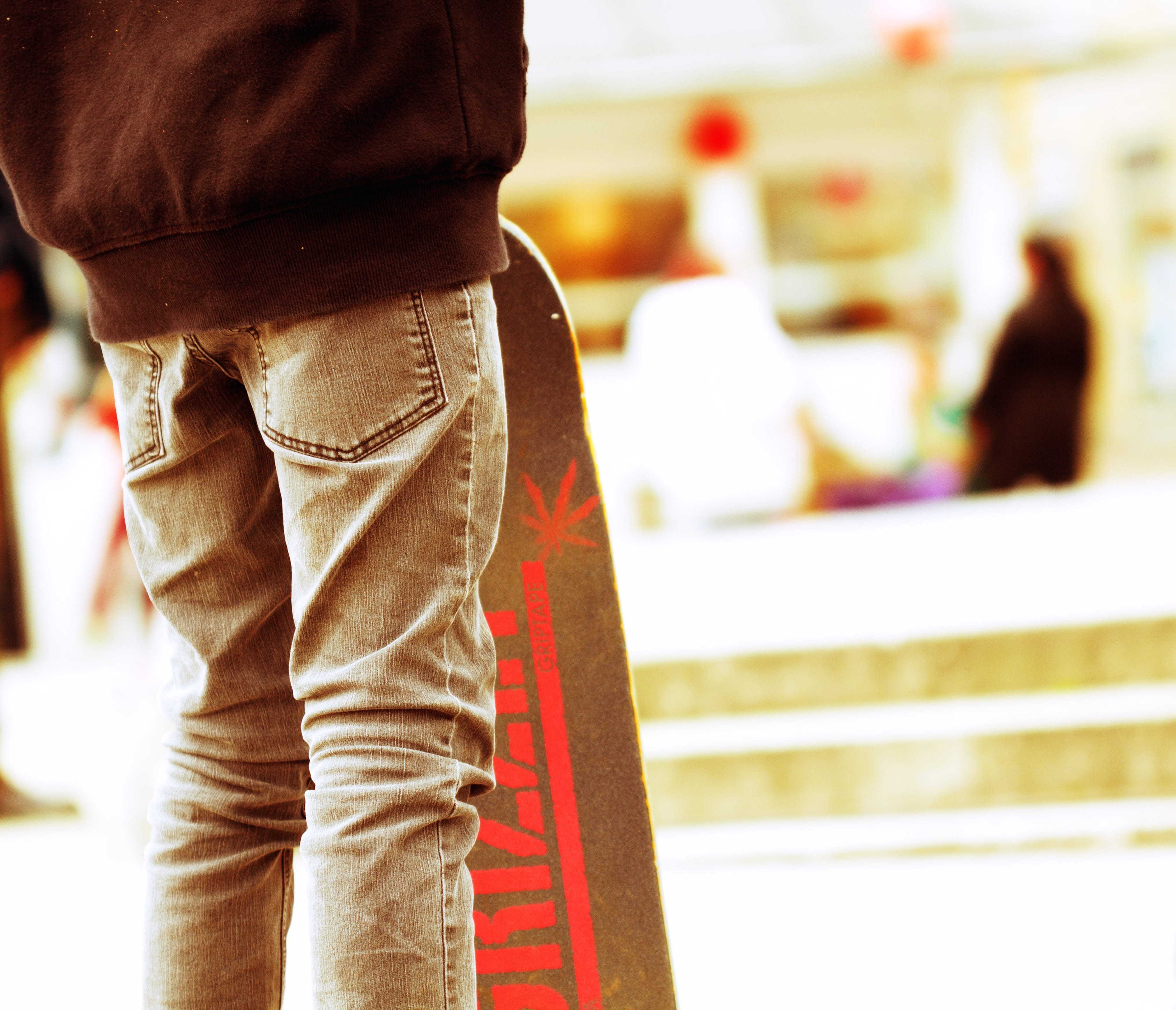 focus on foreground, human limb, real people, adults only, photography, fun, day, casual clothing, incidental people, skateboard, rear view, jeans, people, HD Wallpaper