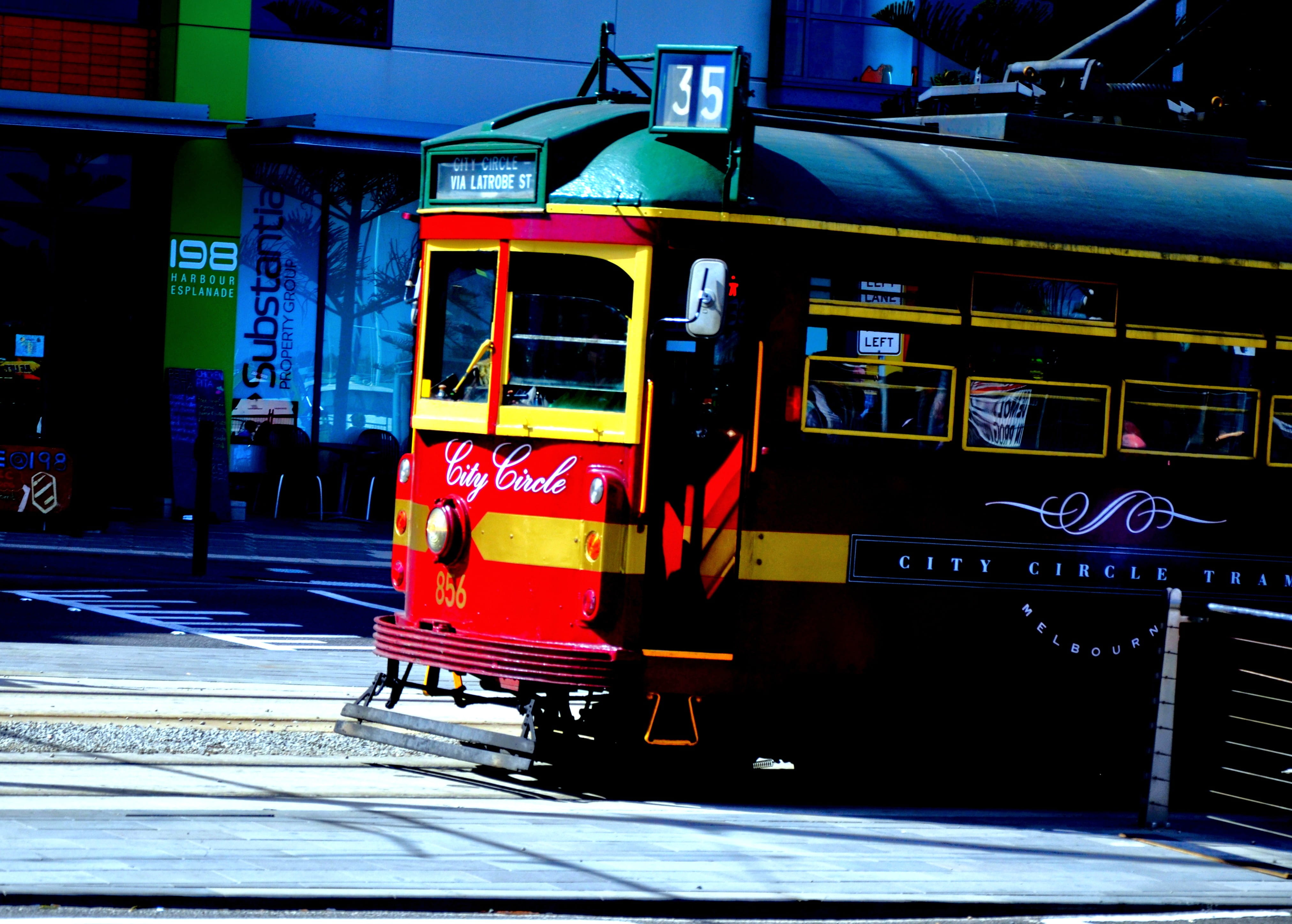 public transportation, tram, flinders street melbourne, bus, outdoors, architecture, railroad track, sunlight, track, built structure, communication, transportation, HD Wallpaper