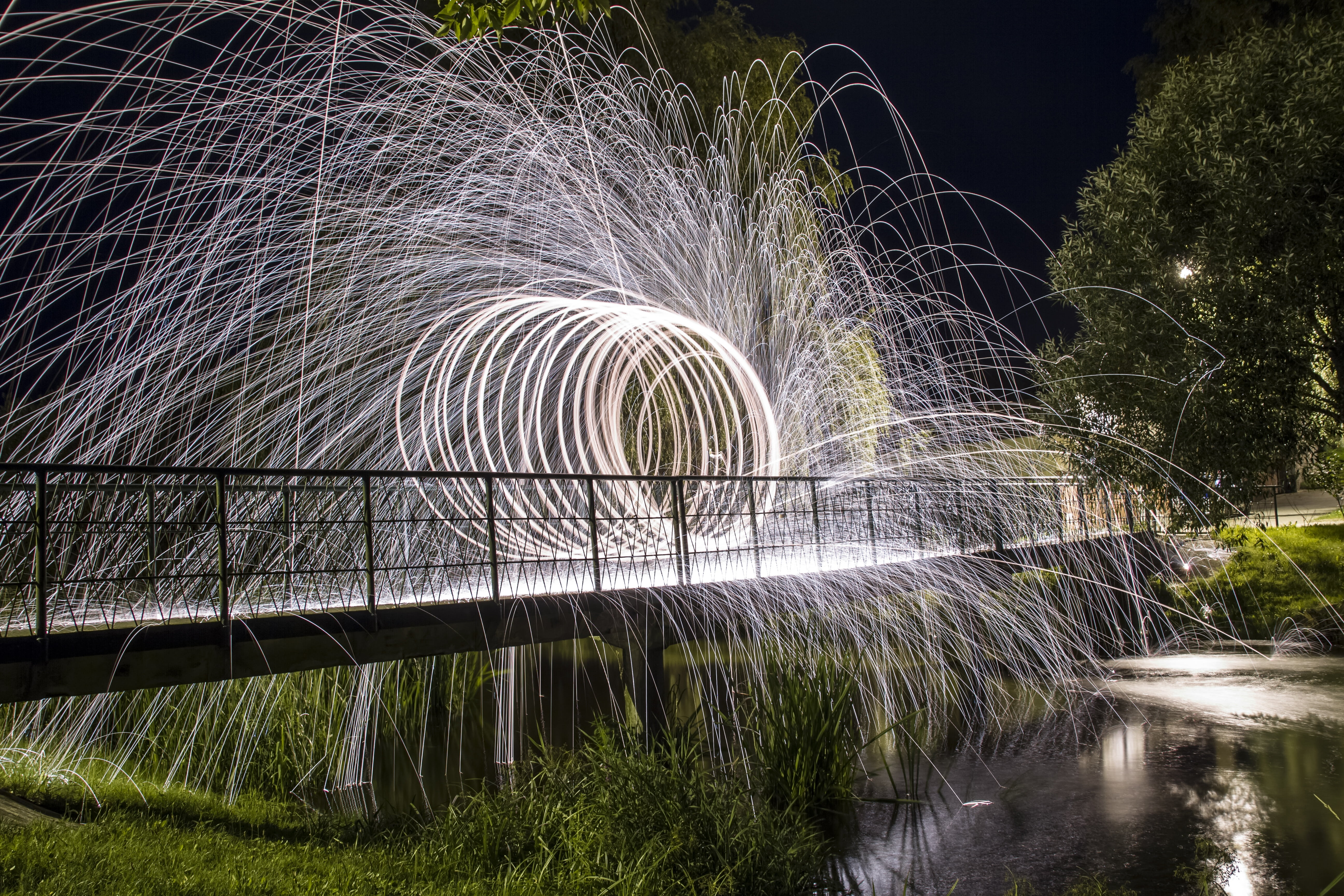 blurred motion, sky, fire, sparks, the darkness, growth, illuminated, flowing water, tree, river, sphere, flashes, bridge, 5K, fire ball, no people, nature, HD Wallpaper