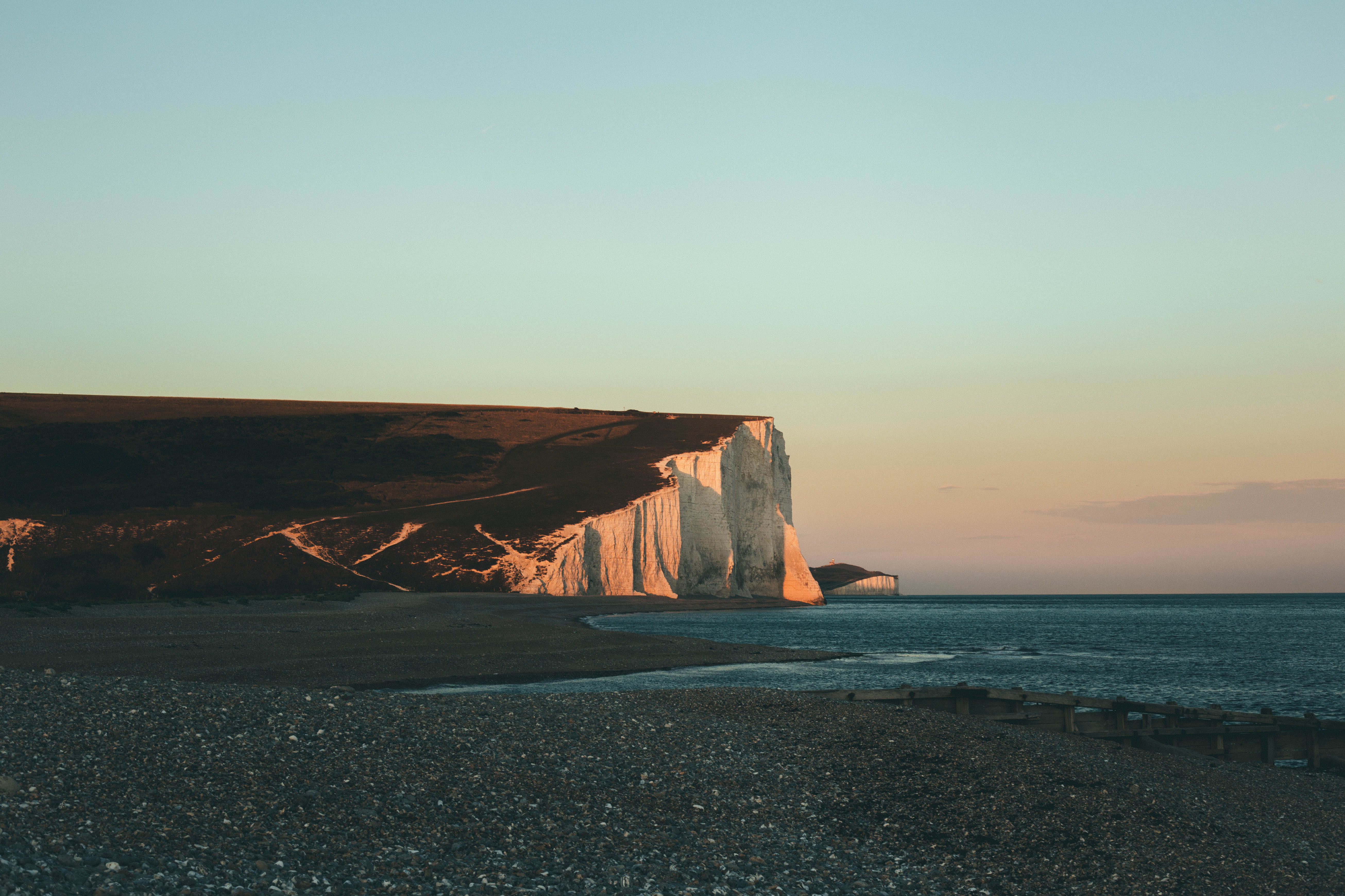 tranquility, photography, beauty in nature, rock formation, nature, scenic, cliff, 5K, seven sisters, solid, tranquil scene, coastline, rock, shoreline, HD Wallpaper