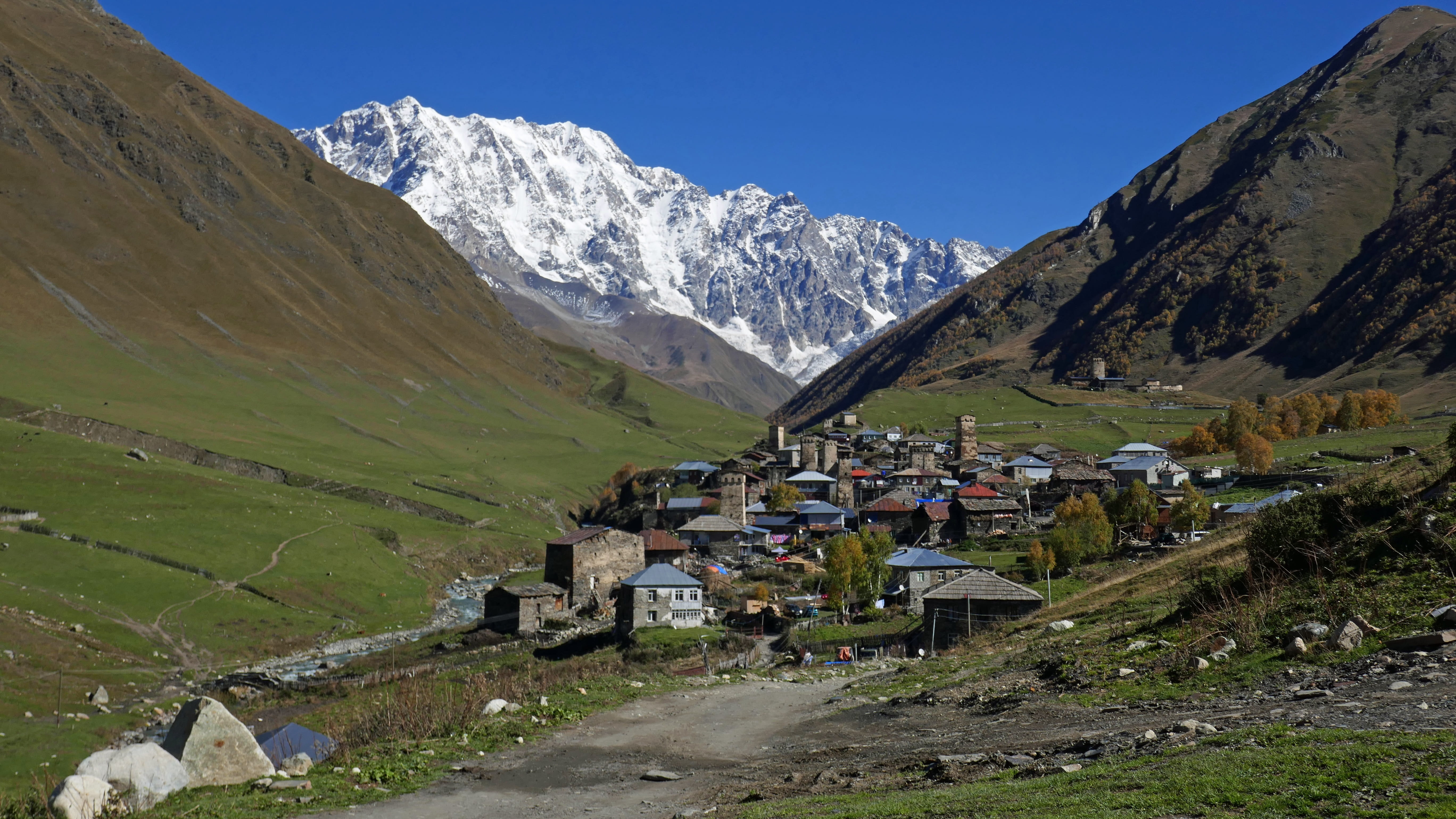 caucasus, city, mountain peak, building exterior, village, snowcapped mountain, no people, mountain, land, ushguli, snow, beauty in nature, house, georgia, HD Wallpaper