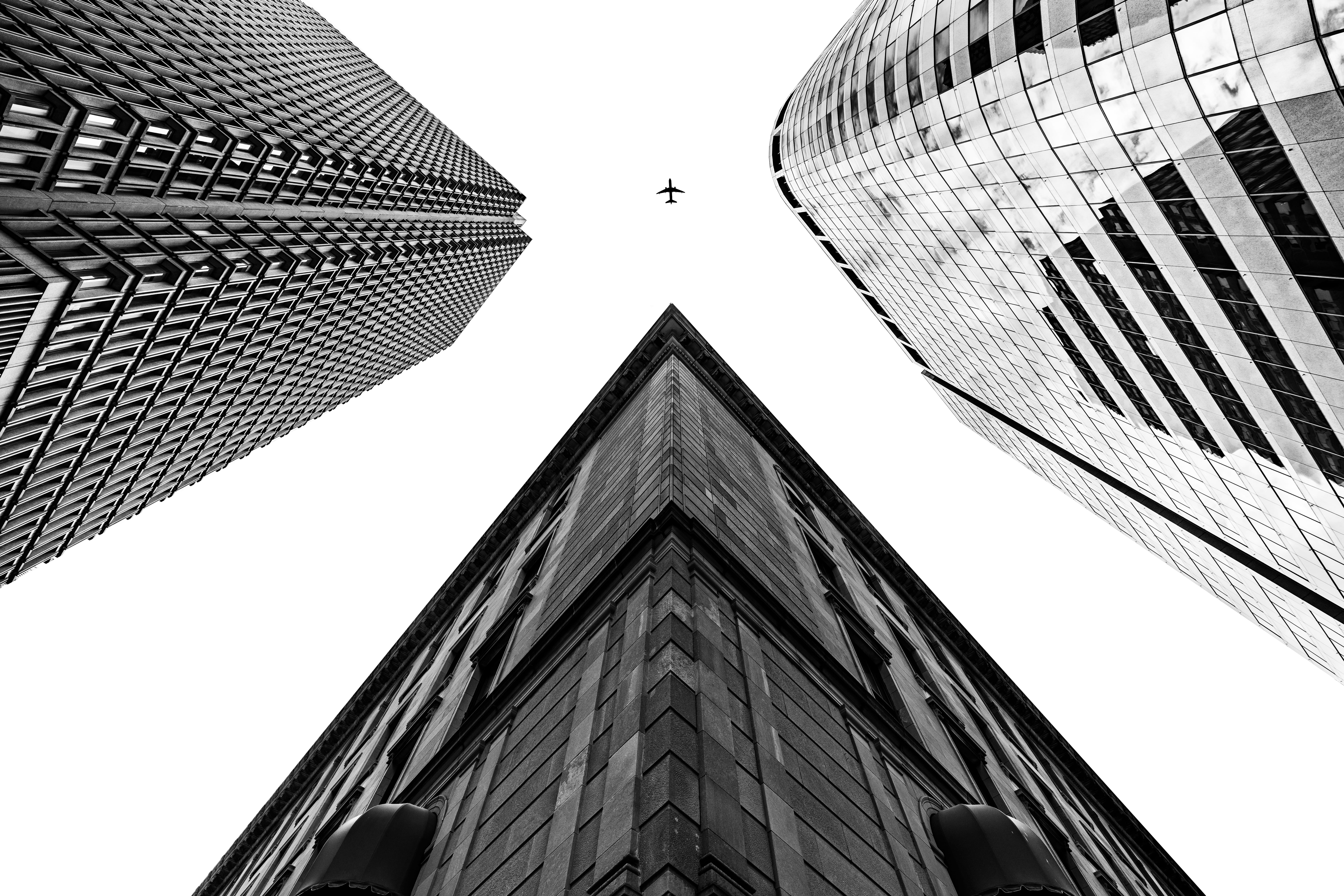 cityscape, glass - Material, city Life, built Structure, tall - High, no People, airplane, steel, facade, urban Scene, famous Place, grayscale, financial District, HD Wallpaper
