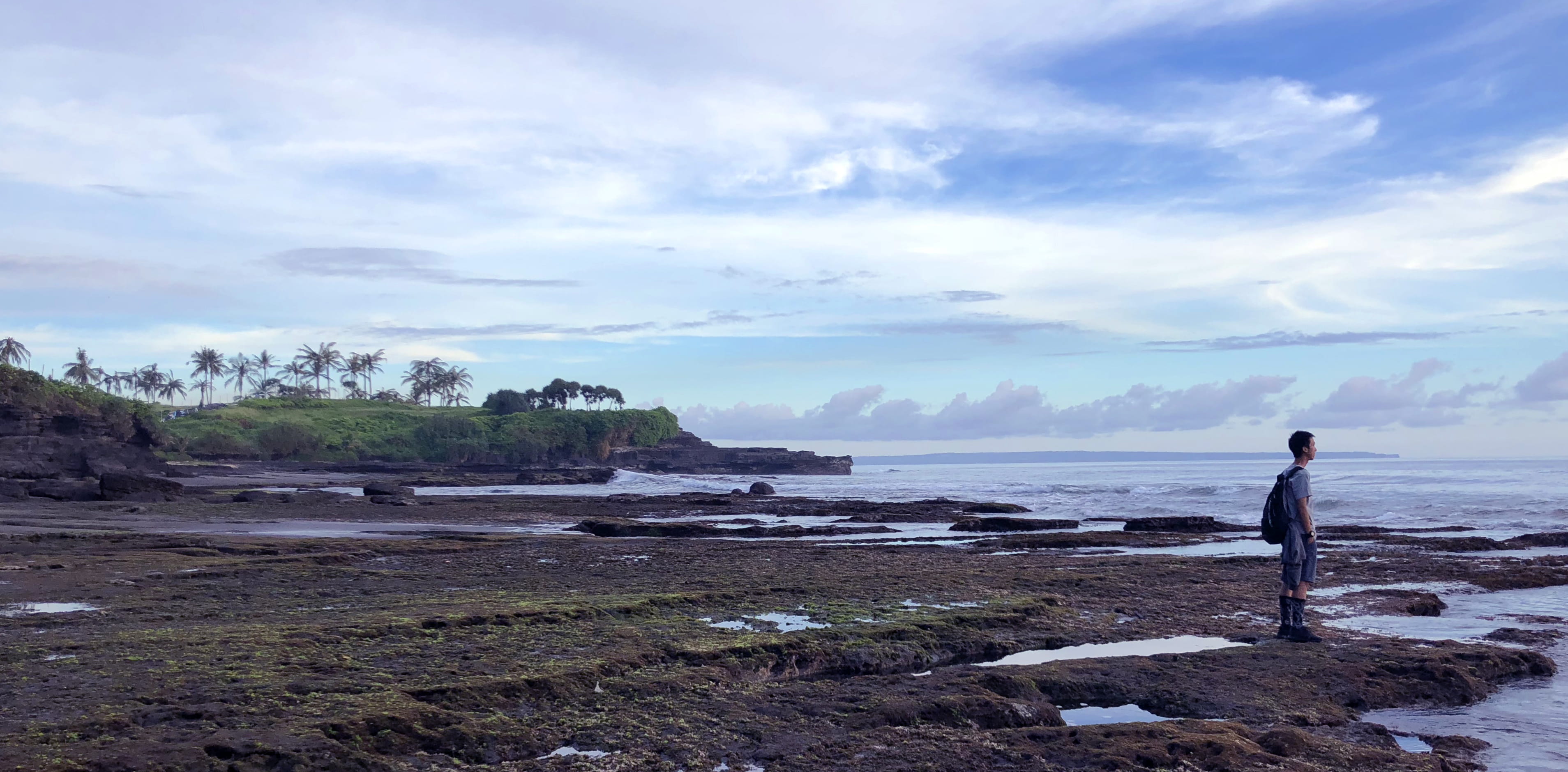 land, real people, scenics - nature, one person, beauty in nature, horizon over water, full length, tanah lot temple, sky, island, cloud, tanah lot, non-urban scene, HD Wallpaper