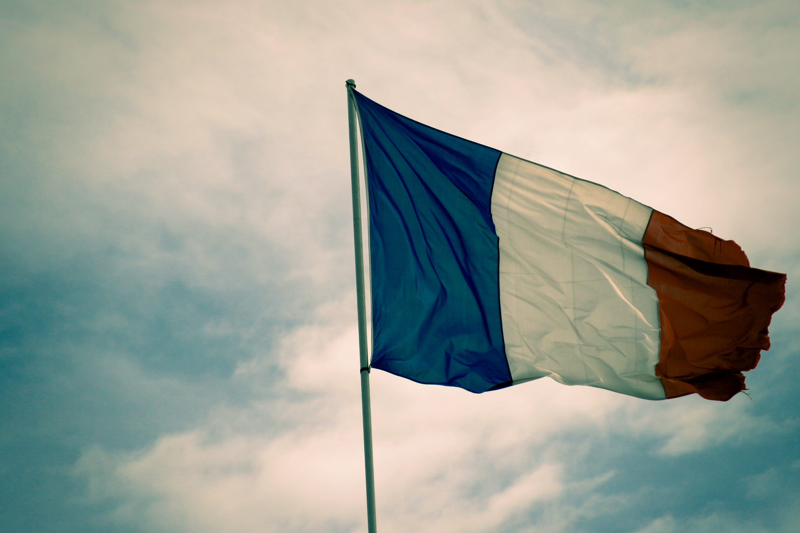 cloud - sky, no people, patriotism, pole, clouds, nature, montpellier, low angle view, sky, environment, emotion, pride, french, red, national icon, waving, HD Wallpaper