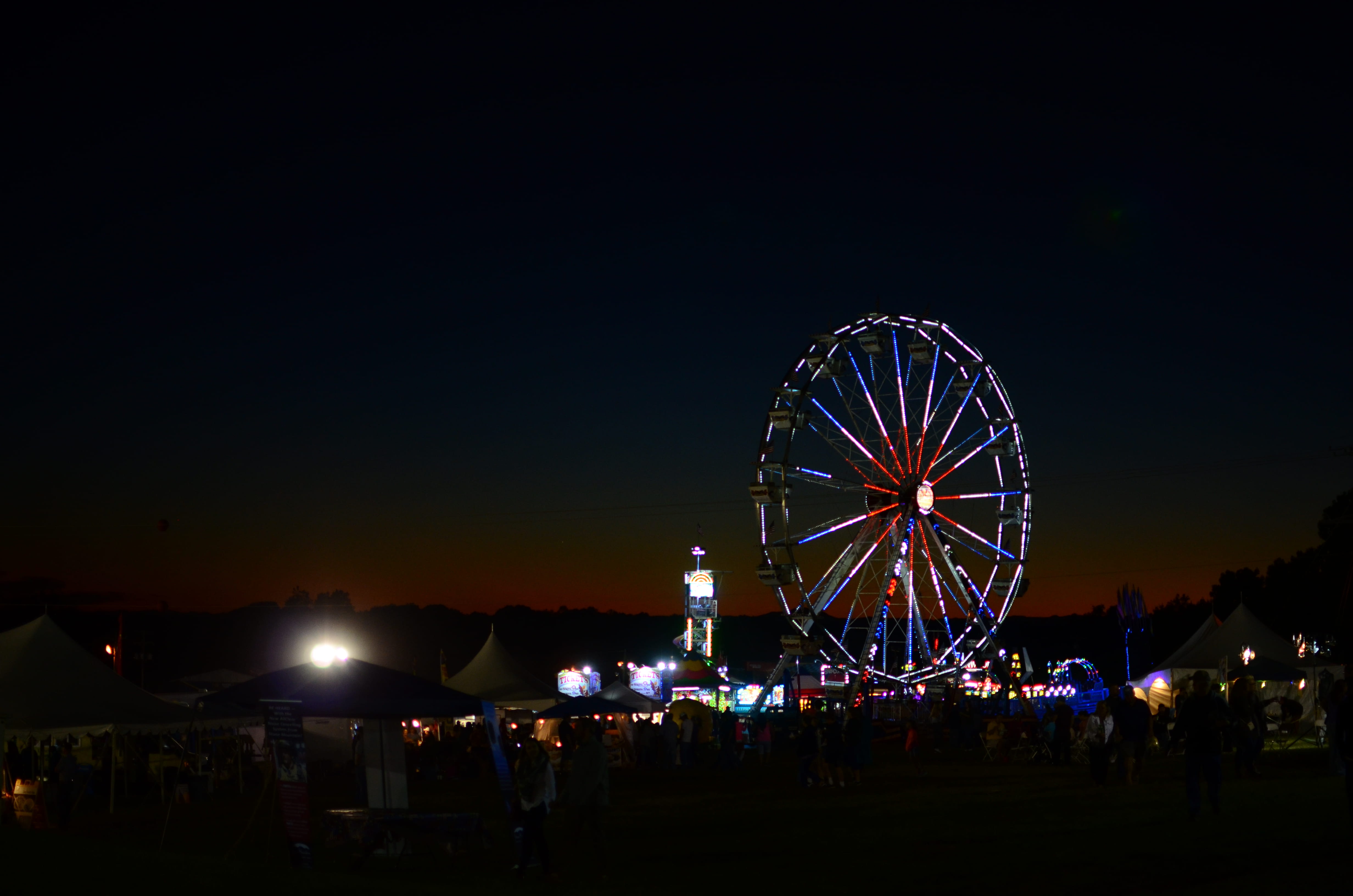 carnival, light, dusk, neon, big wheel, amusement park ride, lighting equipment, nature, built structure, nightlife, bedford, tents, evening, arts culture and entertainment, HD Wallpaper