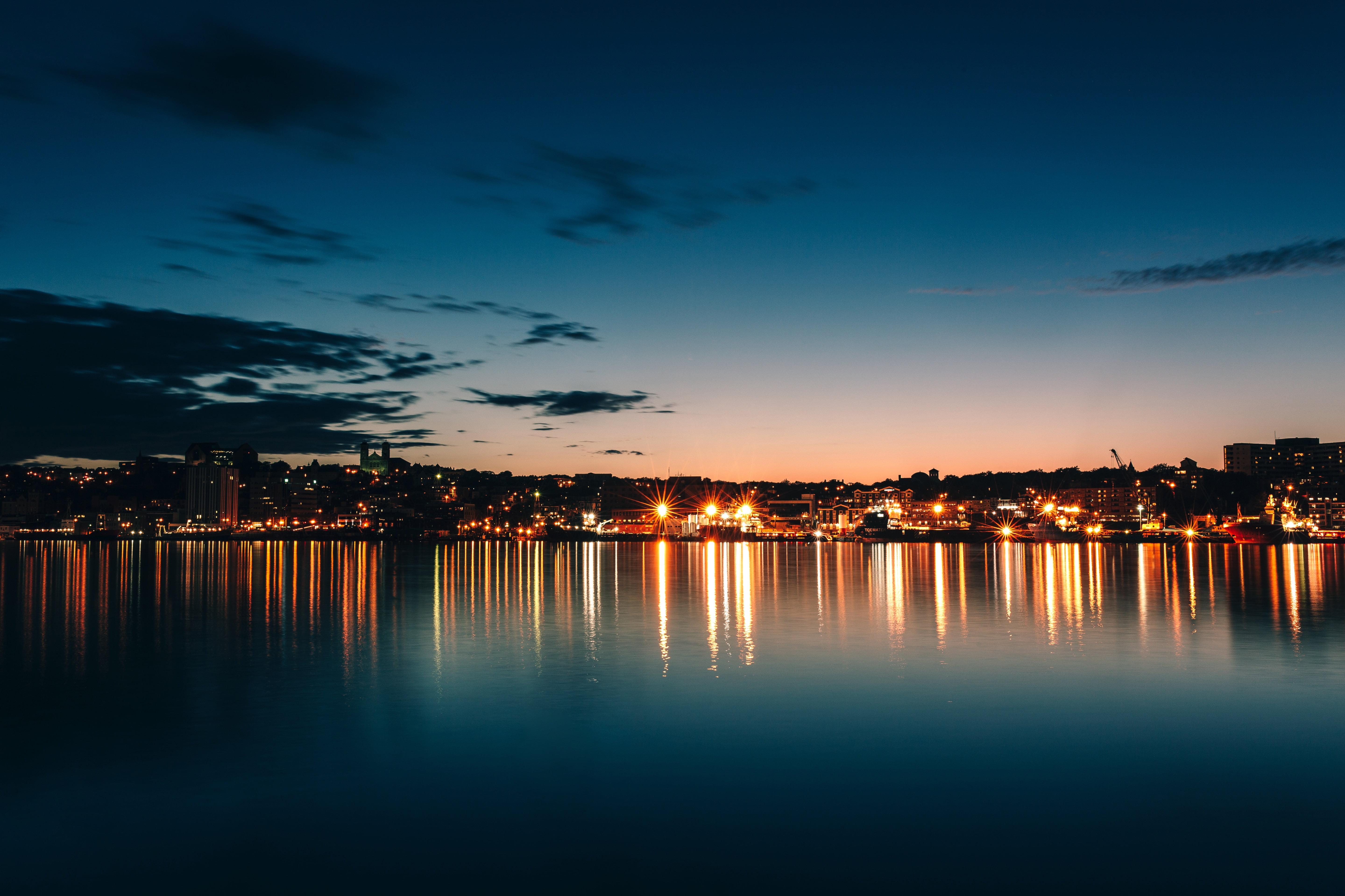 beach, urban Scene, illuminated, river, body, waterfront, famous Place, landscape, sunset, town, outdoors, beauty in nature, reflection, twilight, building, HD Wallpaper