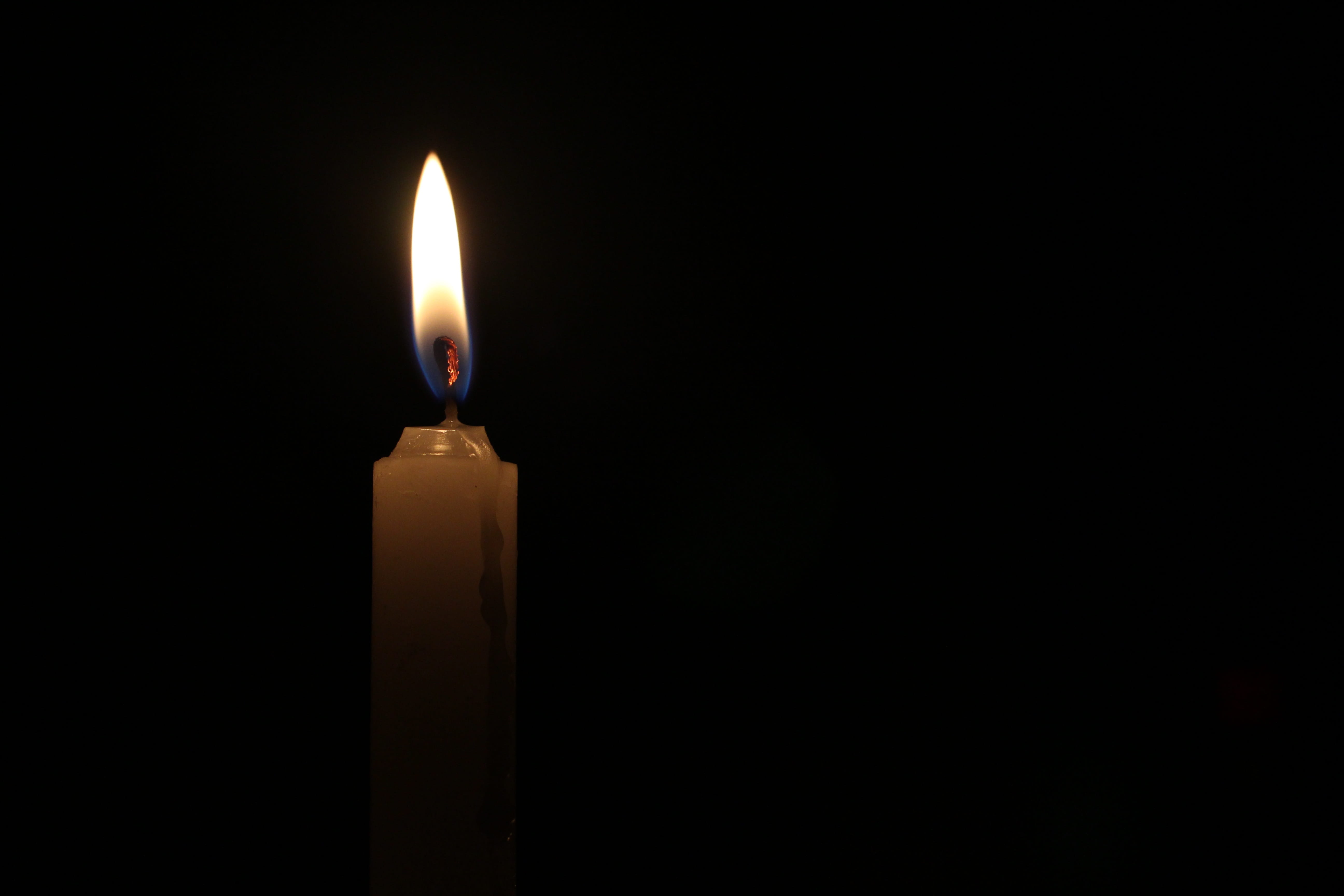 black background, light of a candle, flame, heat - temperature, glowing, moon, darkroom, 5K, wax, illuminated, burned, single object, indoors, copy space, HD Wallpaper
