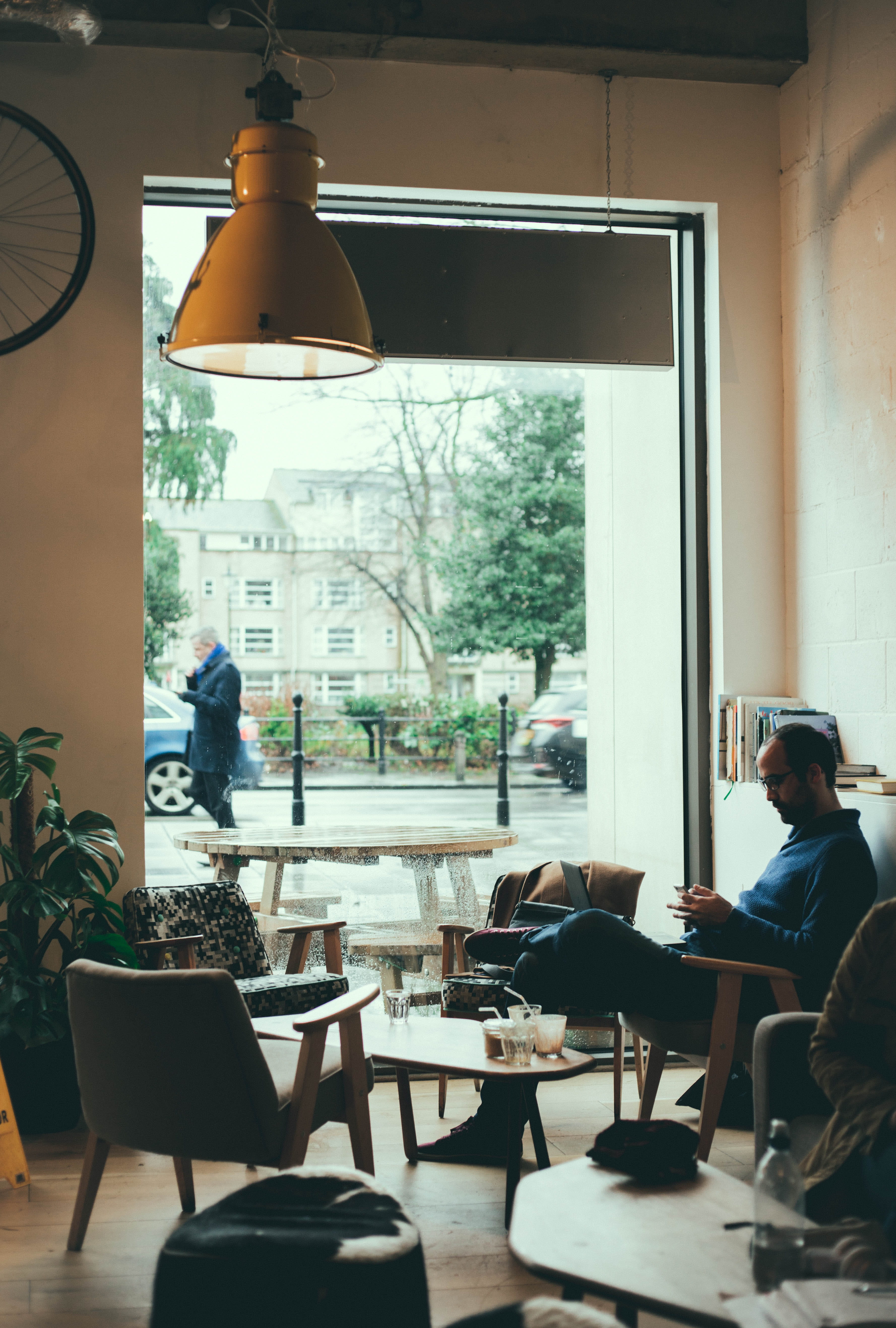 window, lighting equipment, day, 5K, lifestyles, cambridge, swiss cheese plant, man, sitting, rain, chair, rainy day, united kingdom, winter, coffee, women, Phone HD Wallpaper