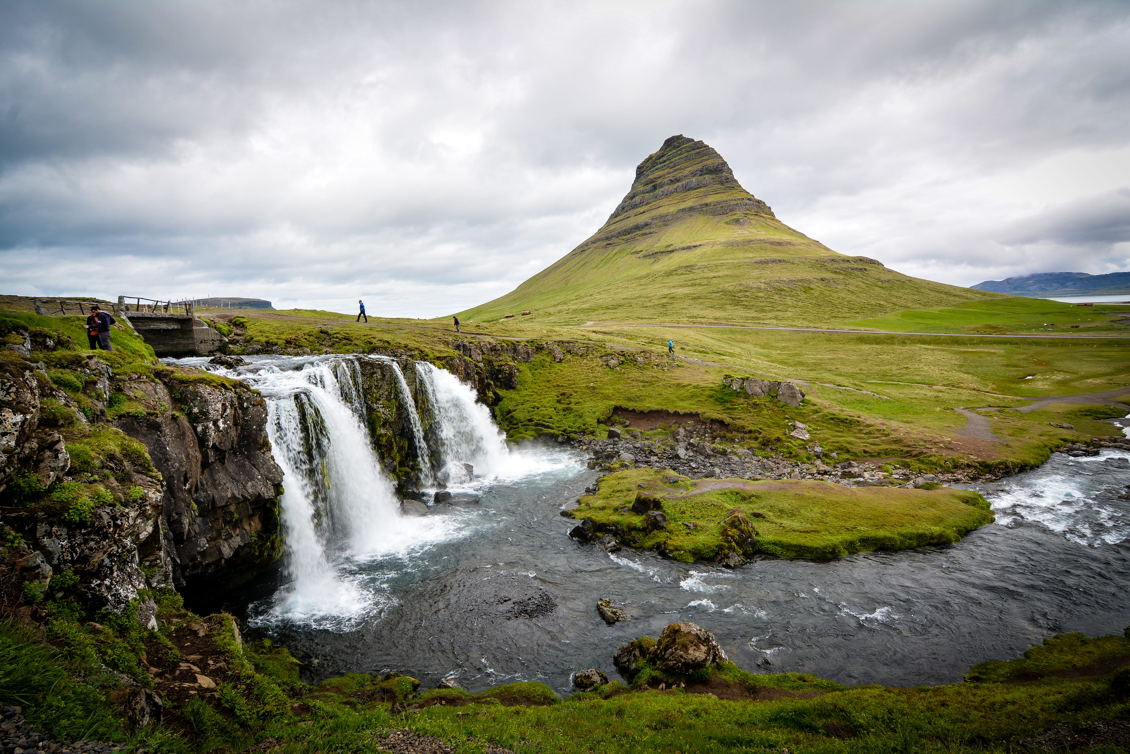 non-urban scene, waterfall, flowing, water, mountain, rural, beside, rock, moss, grass, peak, stream - flowing water, beauty in nature, environment, person, HD Wallpaper