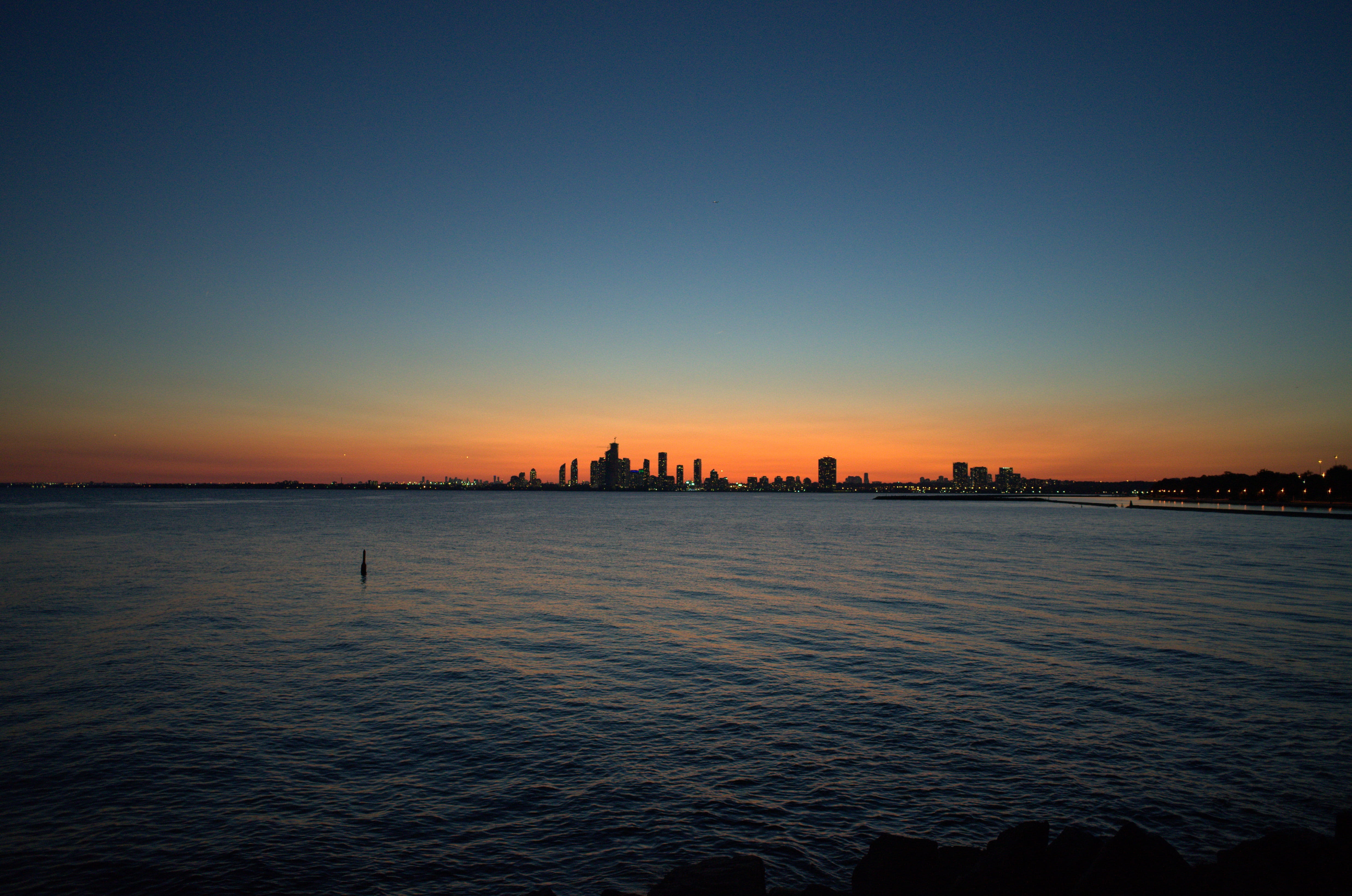 water, skyscraper, view into land, toronto skyline, sunset, building exterior, silhoette, pier, tranquil scene, urban skyline, sunlight, clear sky, dusk, HD Wallpaper