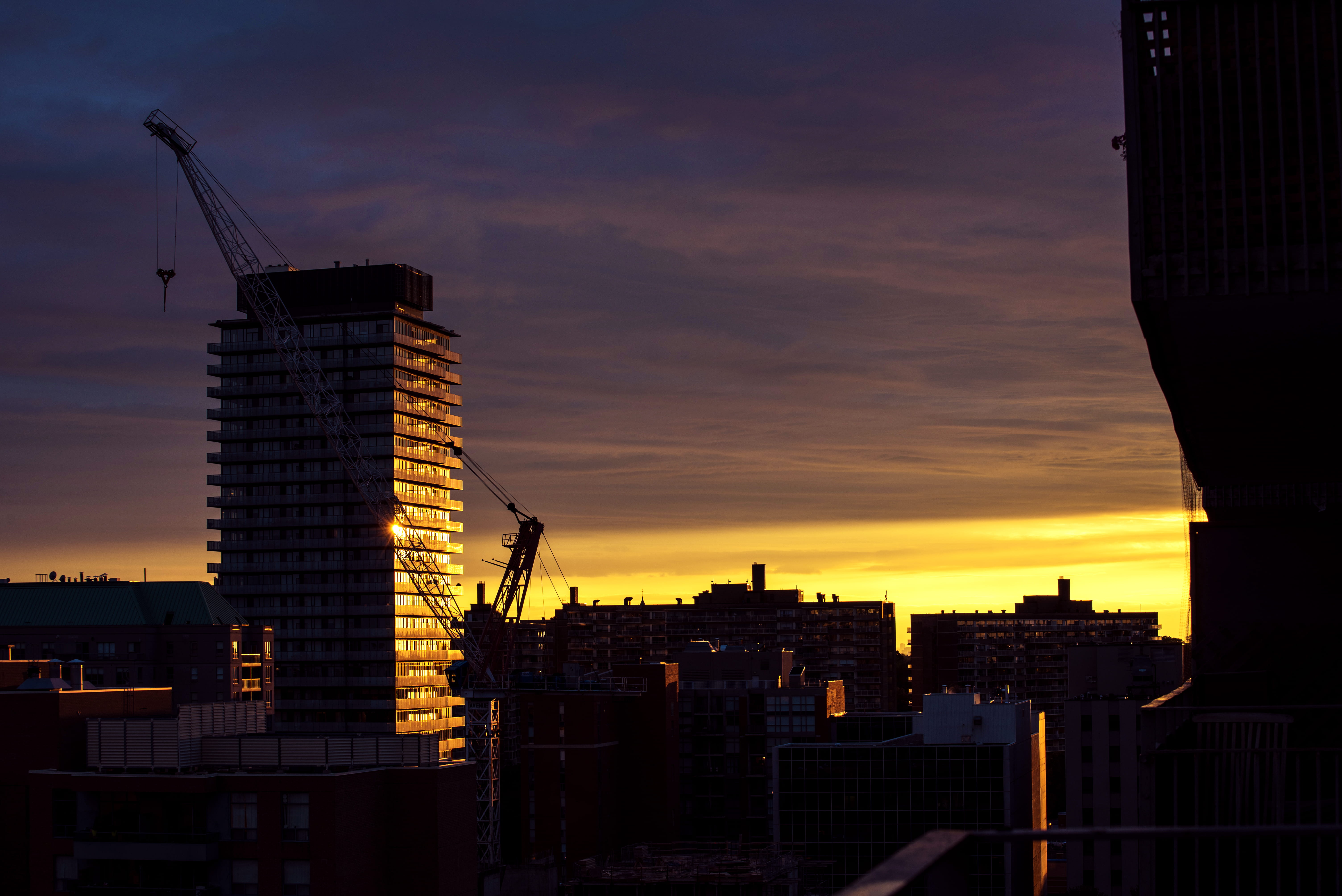 outdoors, urban Scene, rise, architecture, silhouette, residential district, nature, orange color, skyscraper, building, sky, night, high, machinery, urban Skyline, HD Wallpaper