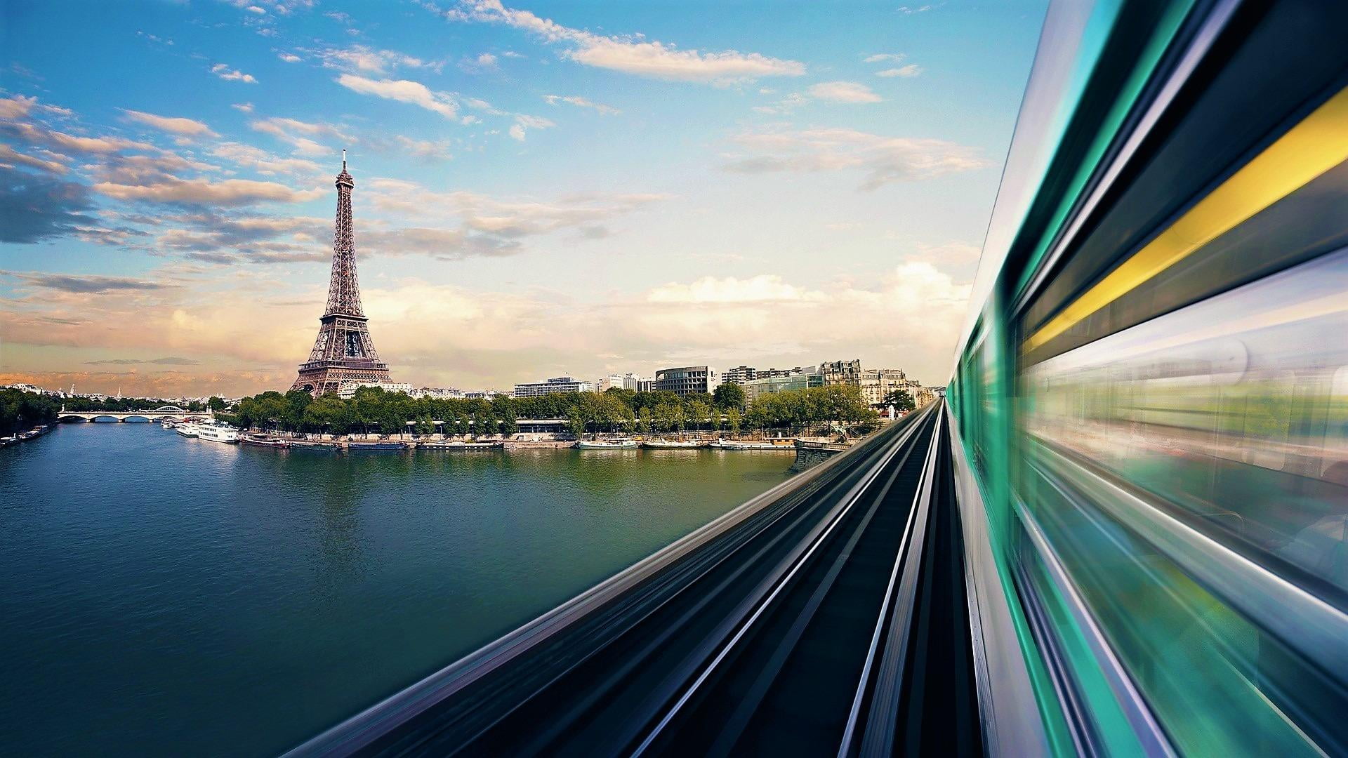 orient express, city, speed, blurred motion, france, cityscape, eiffel tower, no people, train, mode of transportation, 1080P, building exterior, built structure, HD Wallpaper