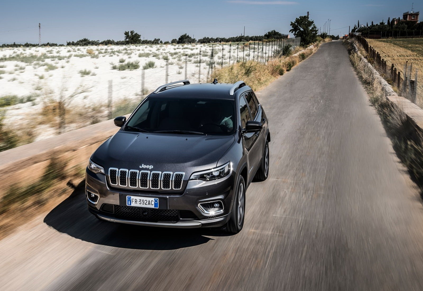 nature, tree, travel, street, sunlight, motor vehicle, no people, jeep, cherokee, (2019), road, transportation, motion, [eu], 720P, car, land vehicle, HD Wallpaper