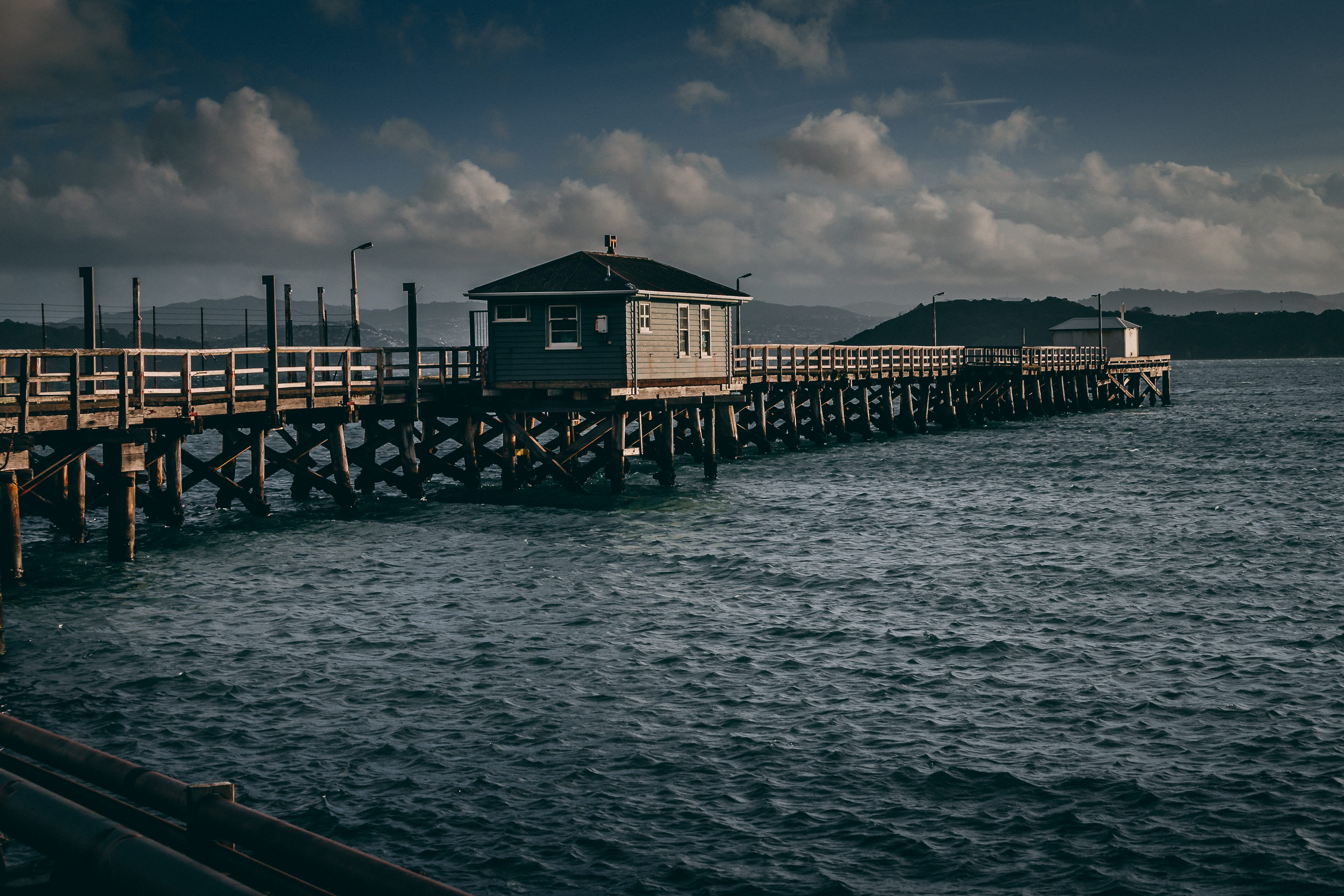 building exterior, sea, no people, built structure, architecture, building, pier, new zealand, cloud - sky, stilt, 4K, scenics - nature, tranquility, wooden post, HD Wallpaper