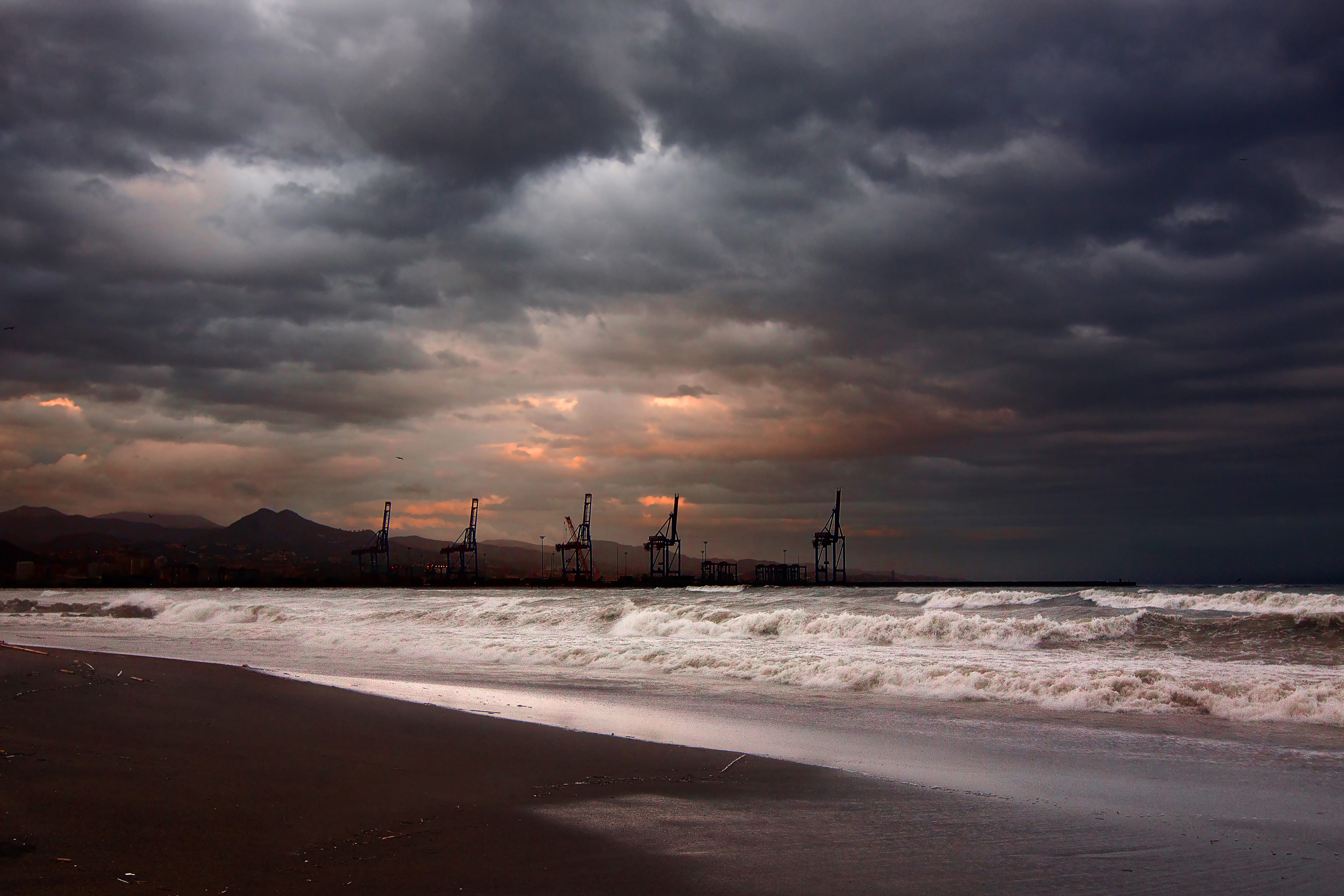 across, wind, scenics - nature, overcast, storm cloud, power in nature, crane, wave, waves, beauty in nature, ominous, shore, sea, coast, dramatic, cloud, HD Wallpaper