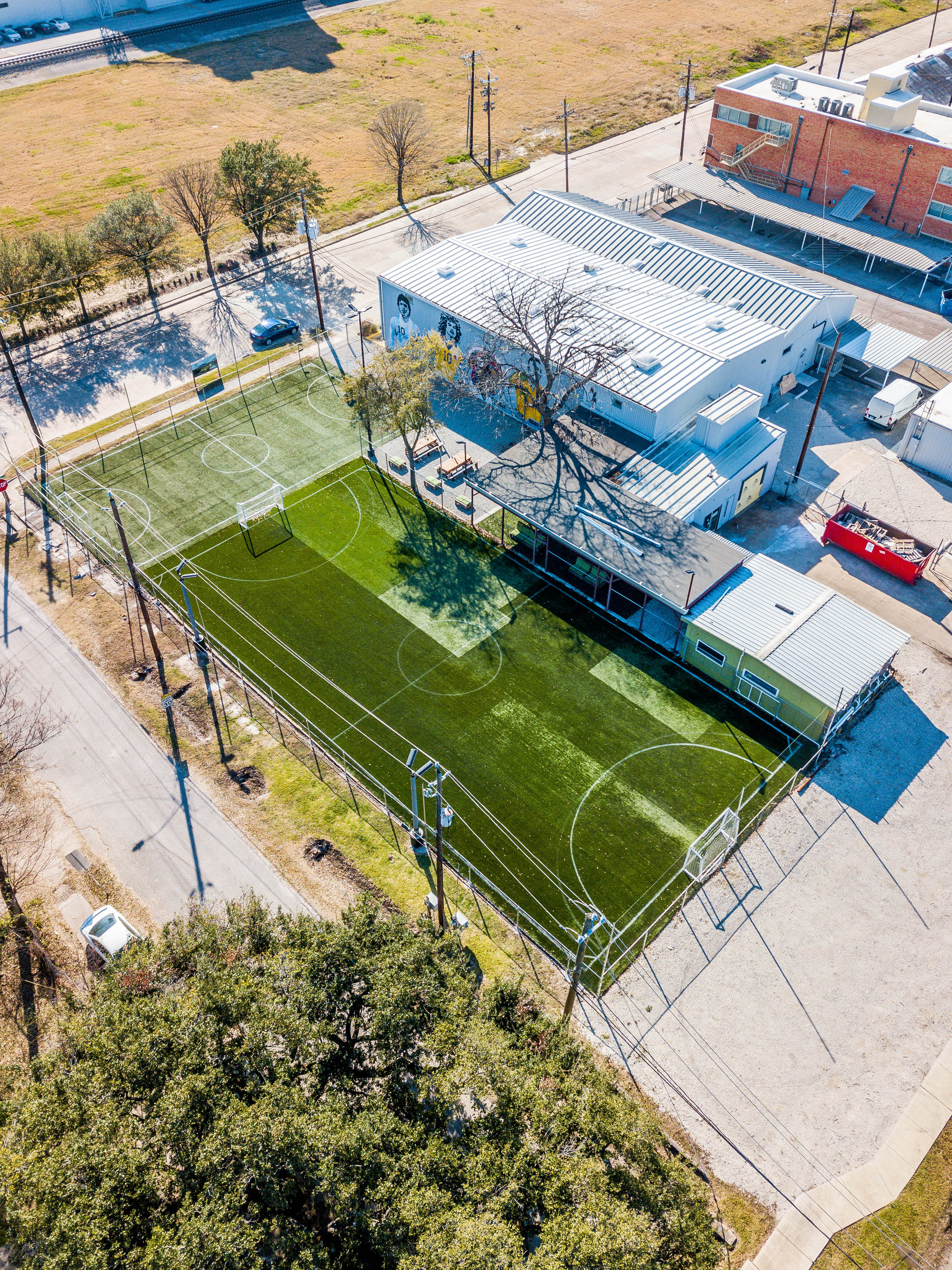 united states, field, outdoors, land, 4K, toros lifestyle soccer, houston, building, aerial view, sunlight, water, building exterior, futbol, drone, built structure, Phone HD Wallpaper
