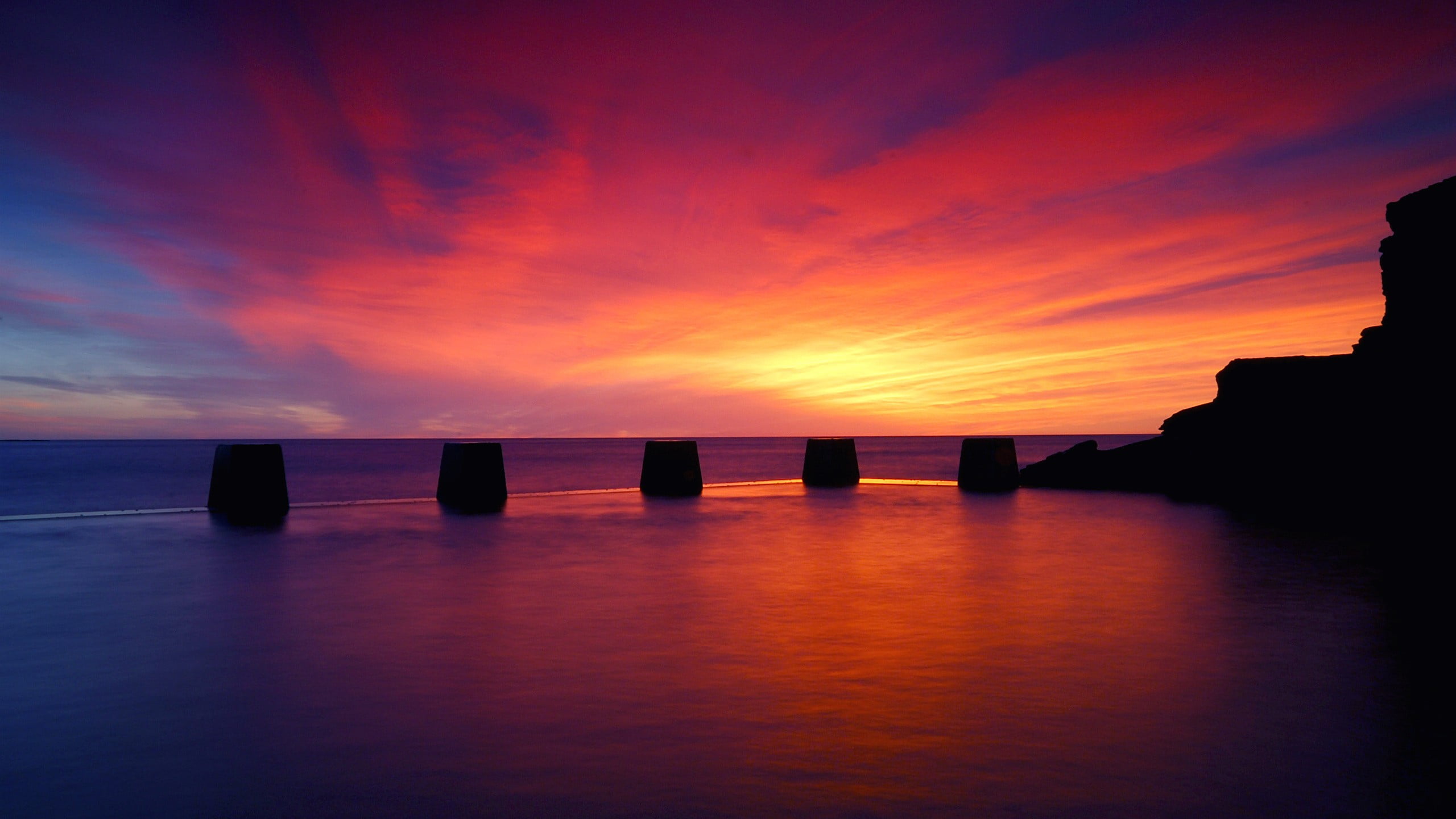 tranquility, idyllic, swimming pool, 2K, wooden post, horizon over water, no people, cloud - sky, sea, reflection, silhouette, tranquil scene, red, nature, HD Wallpaper