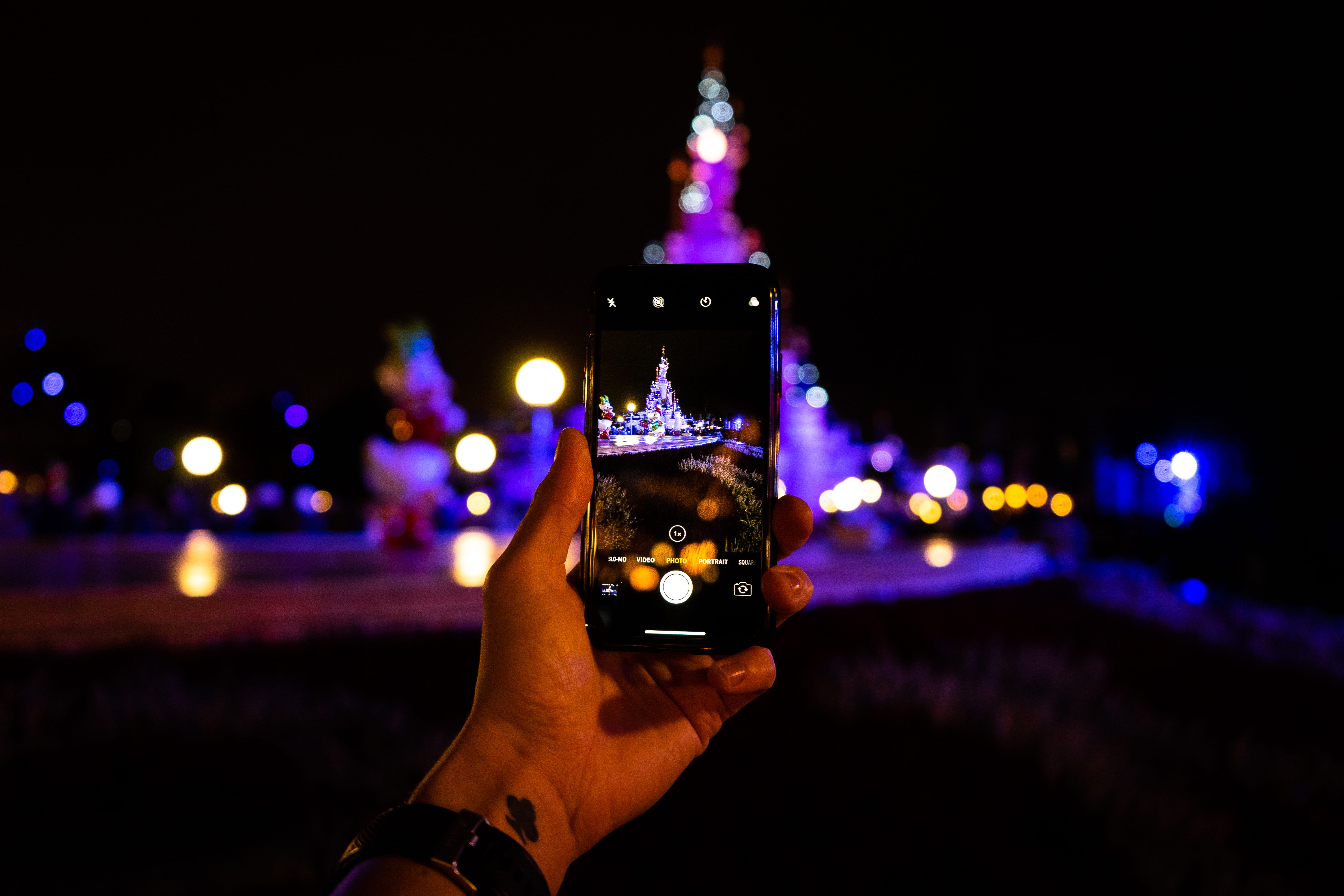 finger, building exterior, technology, communication, focus on foreground, disneyland paris, personal perspective, photography themes, wireless technology, HD Wallpaper