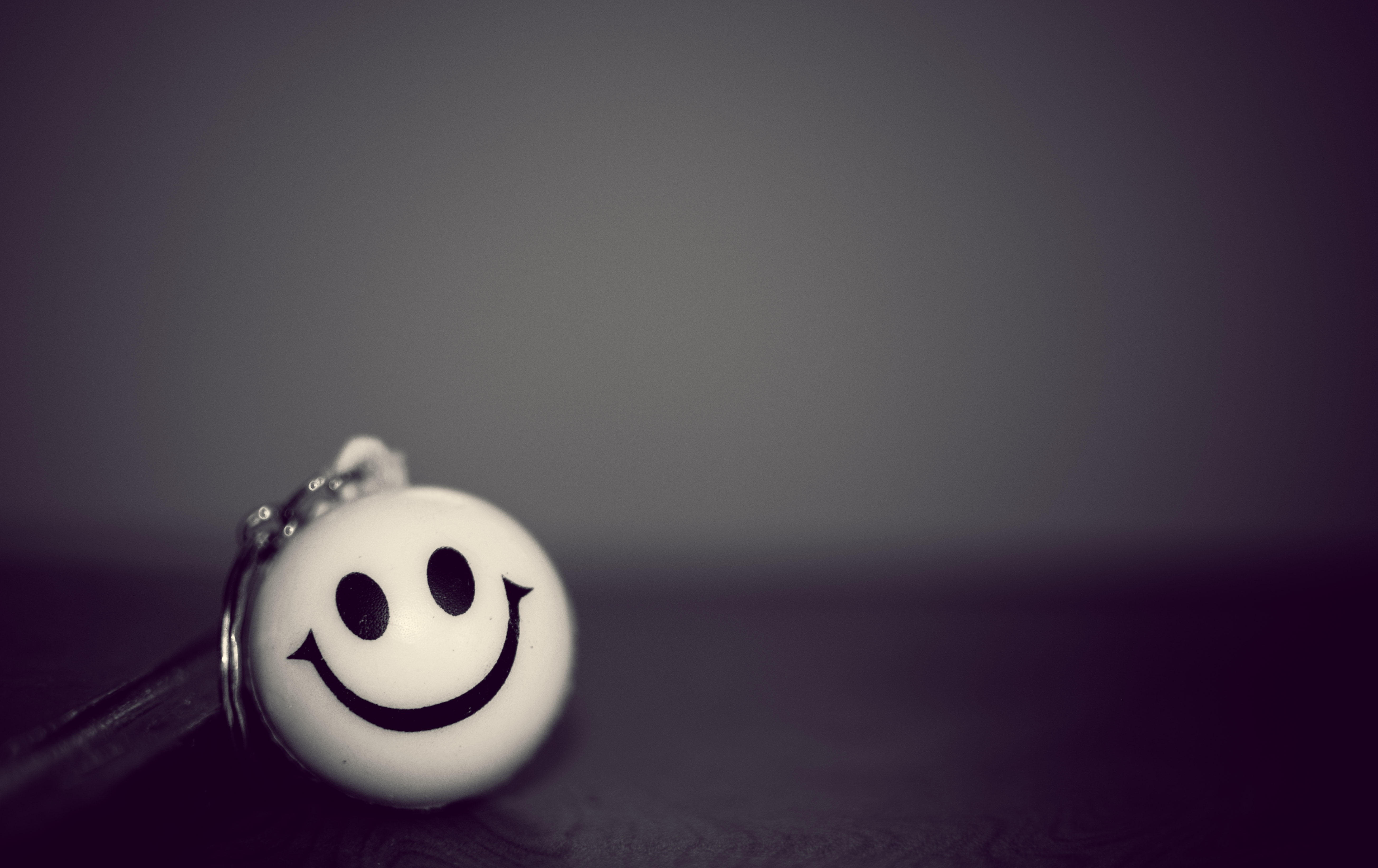 happiness, smiley, toy, no people, still life, table, panda - animal, representation, copy space, close-up, keychain, 5K, indoors, white color, mammal, HD Wallpaper