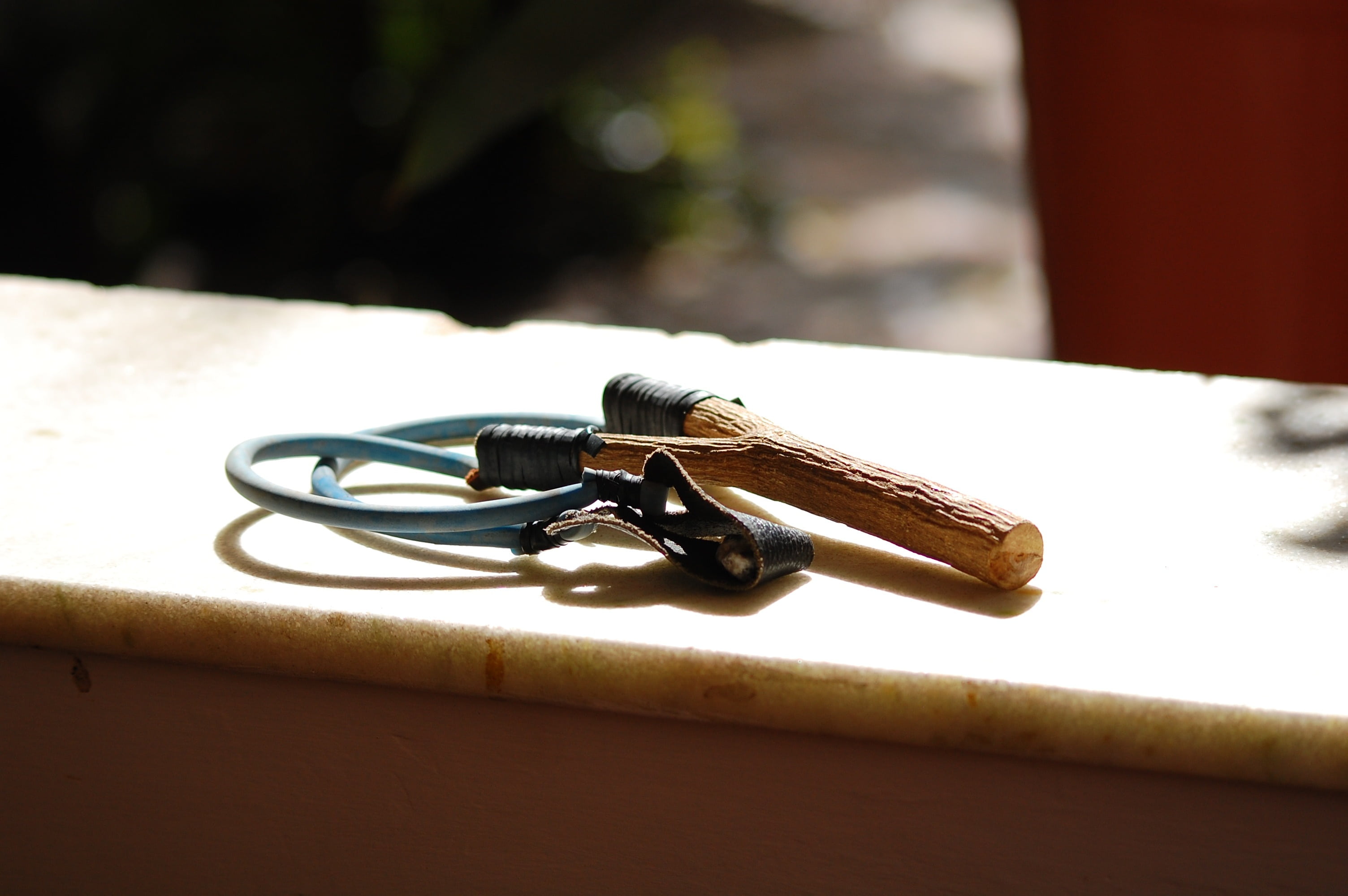 still life, metal, table, selective focus, brown, wood - material, ring, 2K, surface, childhood, connection, hunting, indoors, two objects, tied up, focus on foreground, HD Wallpaper