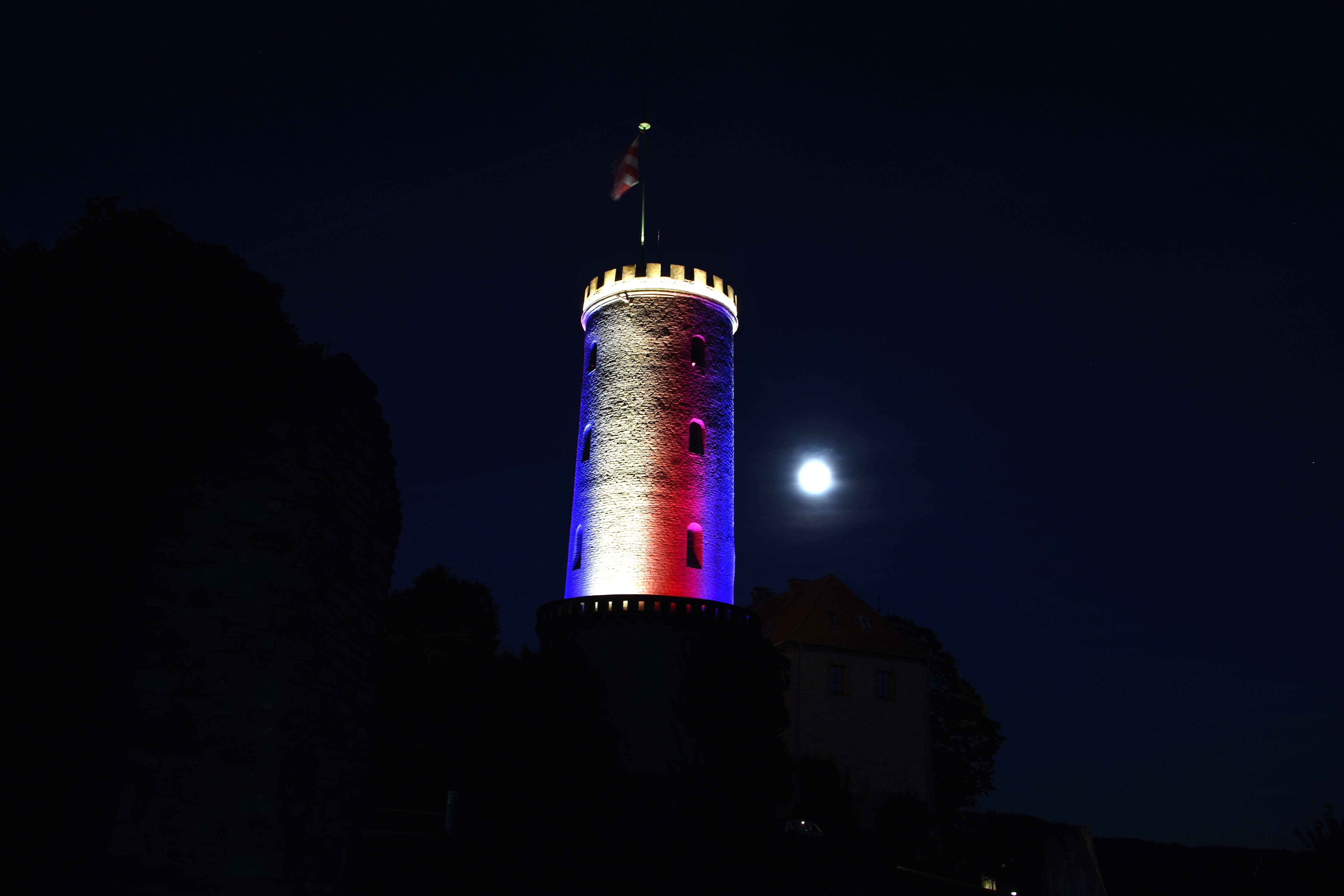 Night, guidance, illuminated, low angle view, security, architecture, places of interest, Bielefeld, building, lighthouse, battlements, tall - high, no people, HD Wallpaper