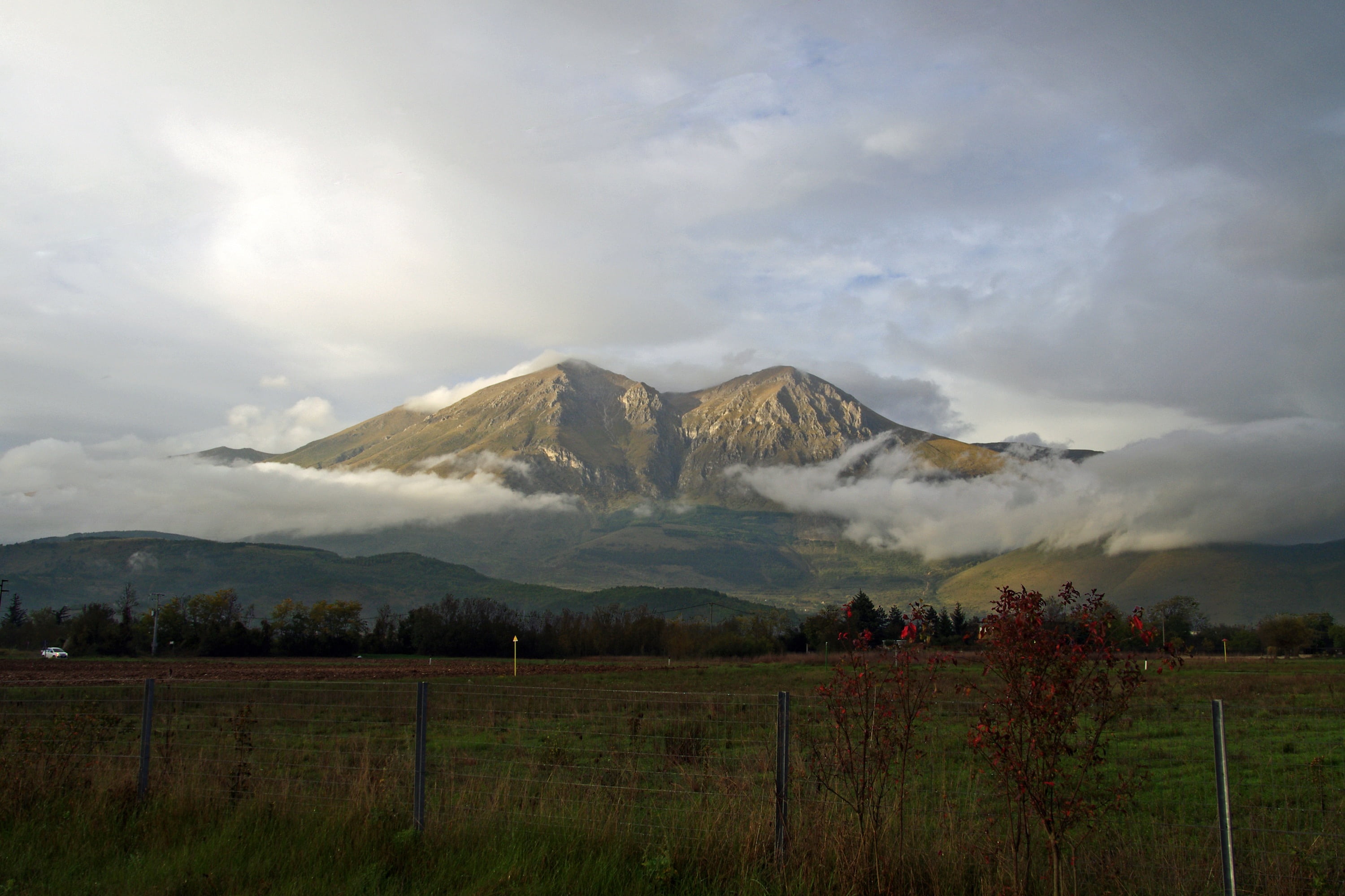 green, mountain range, environment, 2K, grass, mountain peak, mount velino, nature, abruzzo, cloud - sky, cloudy, tranquil scene, autumn, scenics, tree, HD Wallpaper