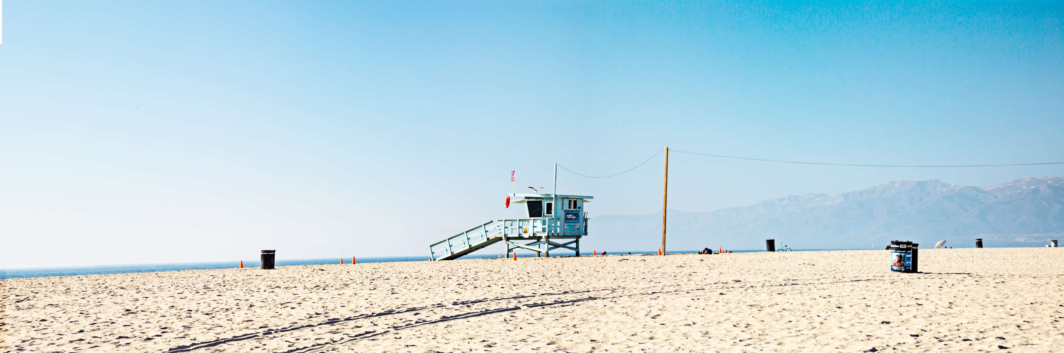 california, man made structure, blue, clear sky, land, sand, day, 2K, nature, lifeguard hut, hut, ocean, mountains, safety, built structure, copy space, HD Wallpaper