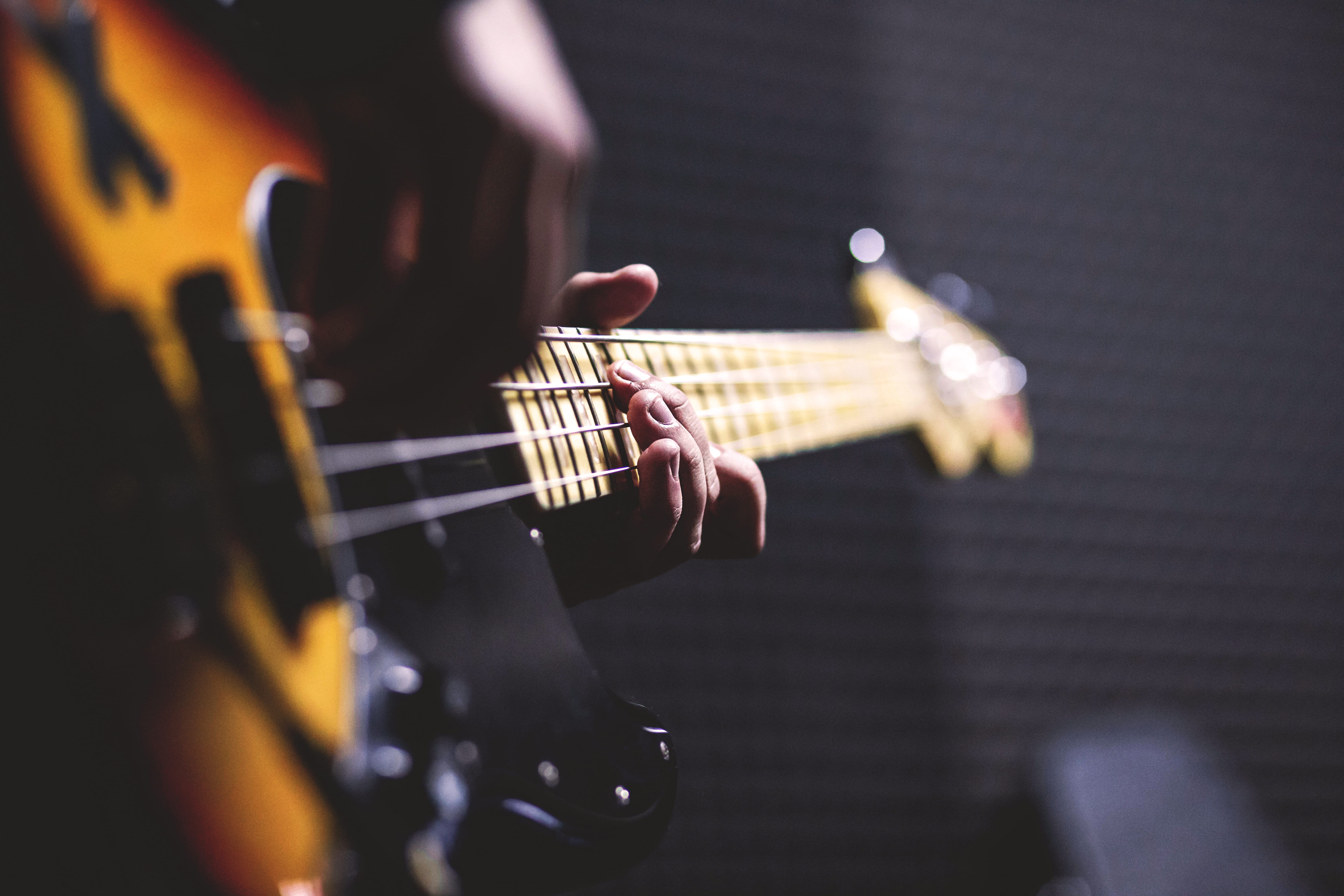 musical equipment, musical instrument, string, stage, bokeh, hand, person, sun, musician, playing, focus on foreground, guitarist, electric, bass guitar, HD Wallpaper