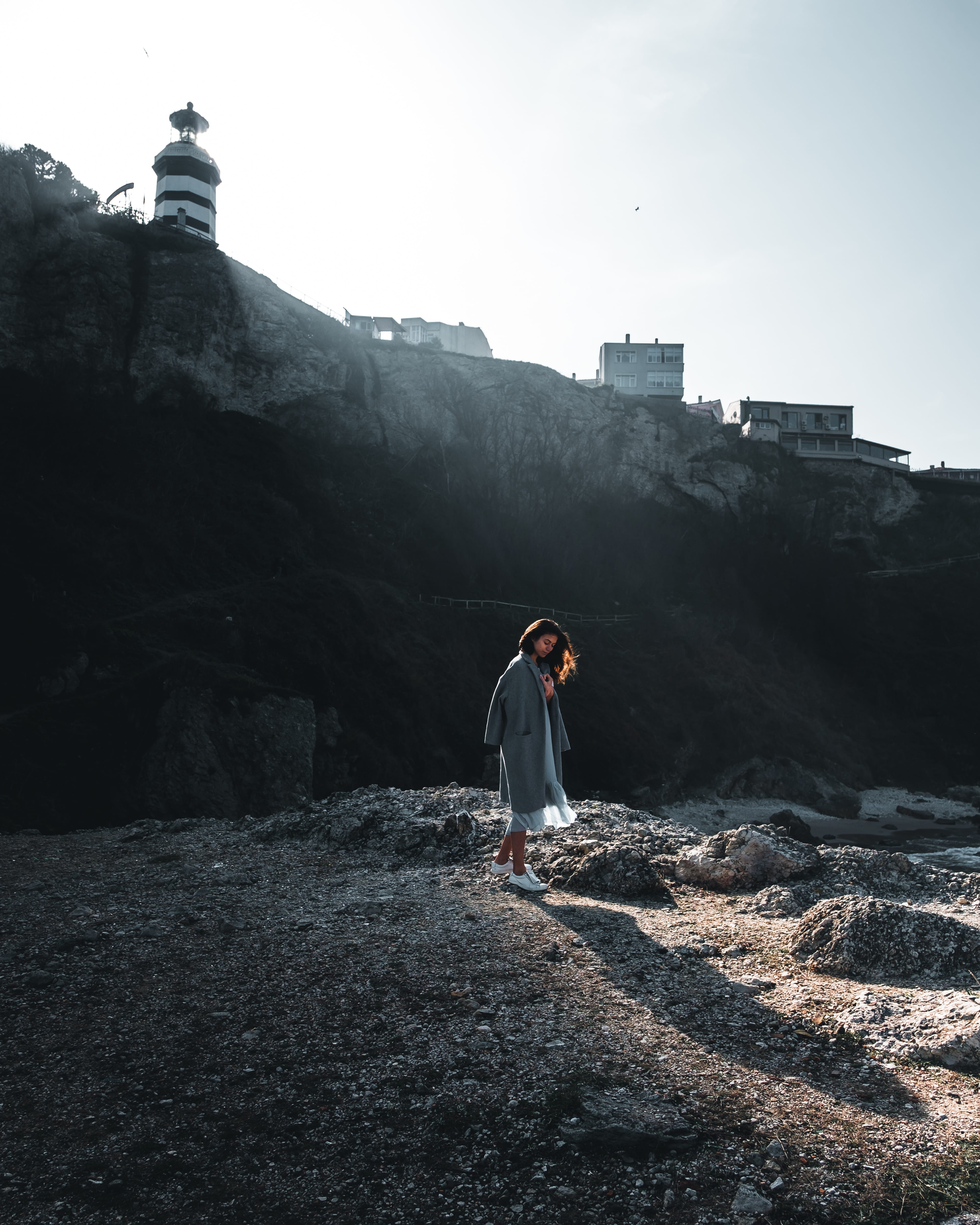 contract, cliff, young adult, day, casual clothing, brunette, nature, walking, woman, human, people, portrait, coat, shadow, history, holding, clear sky, Phone HD Wallpaper