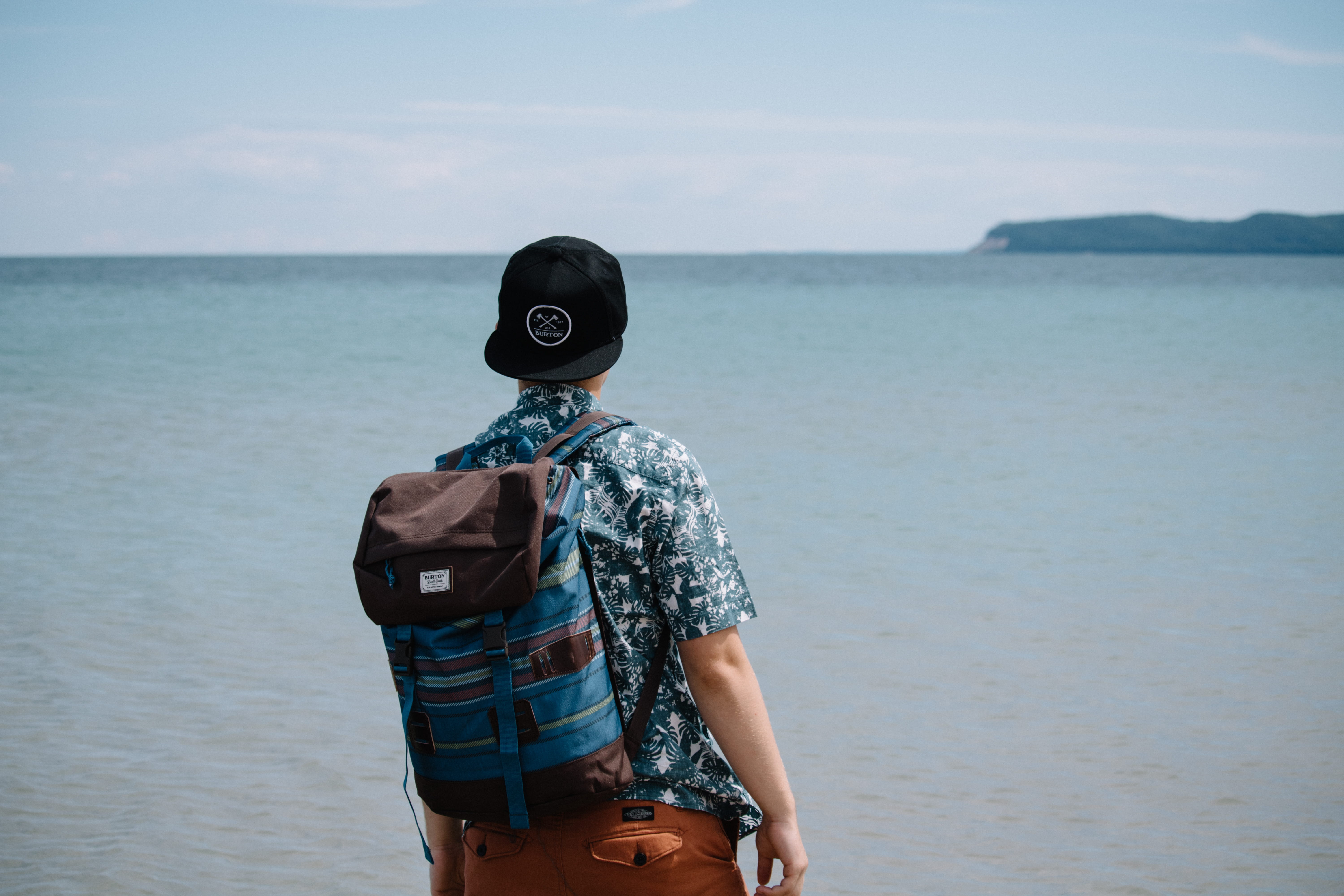 vacations, scenics - nature, people, water, human, looking at view, beauty in nature, standing, hat, tranquil scene, wearing, behind, body, sleeping bear dune, HD Wallpaper
