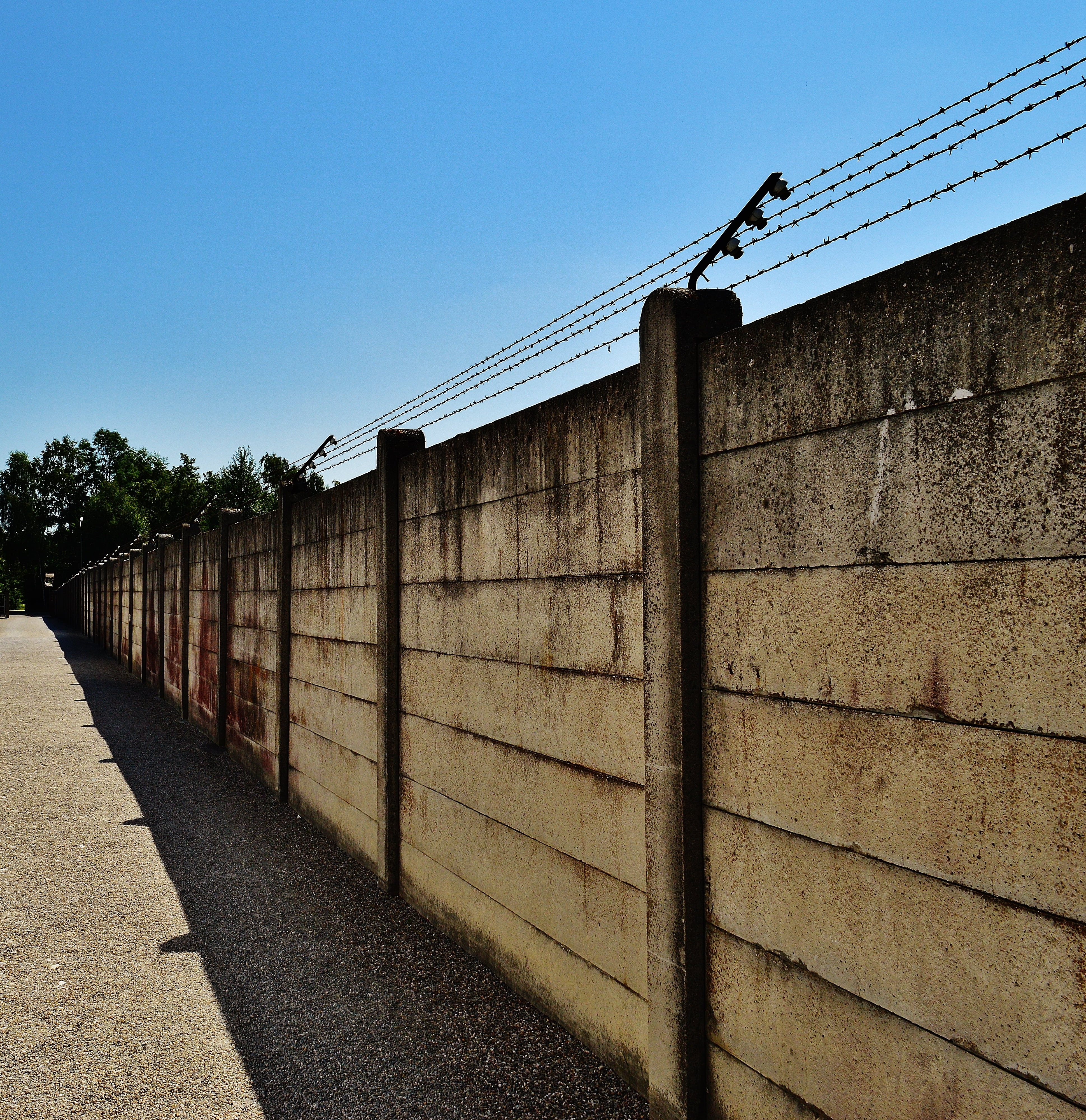 death, direction, bad, memorial, architecture, past, wall, konzentrationslager, clear sky, safety, no people, terrible, blue, wall - building feature, sunlight, Phone HD Wallpaper