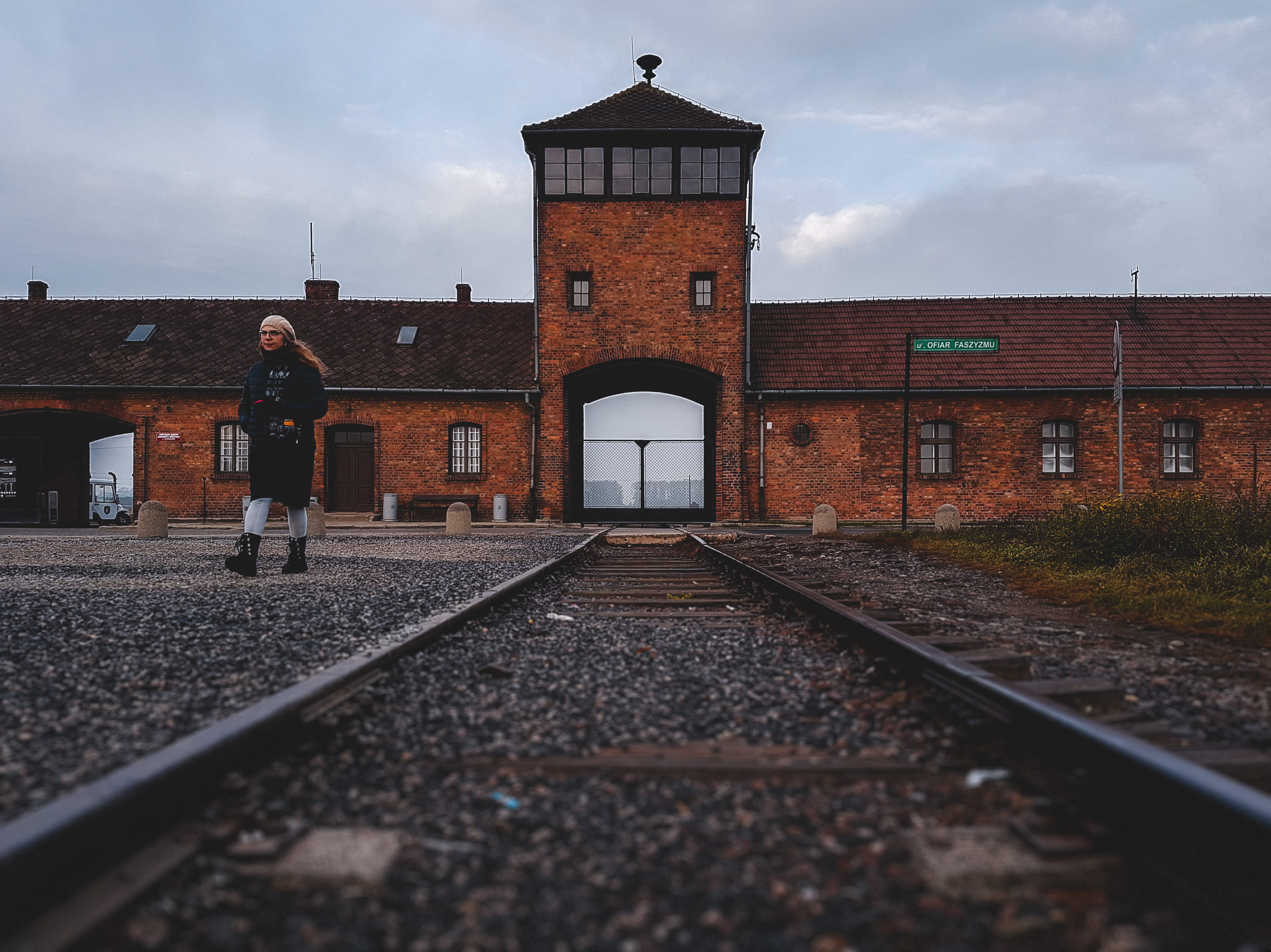 still alive, real people, surface level, oświęcim, day, railroad track, track, building exterior, poland, auschwitz, nature, built structure, rail transportation, HD Wallpaper