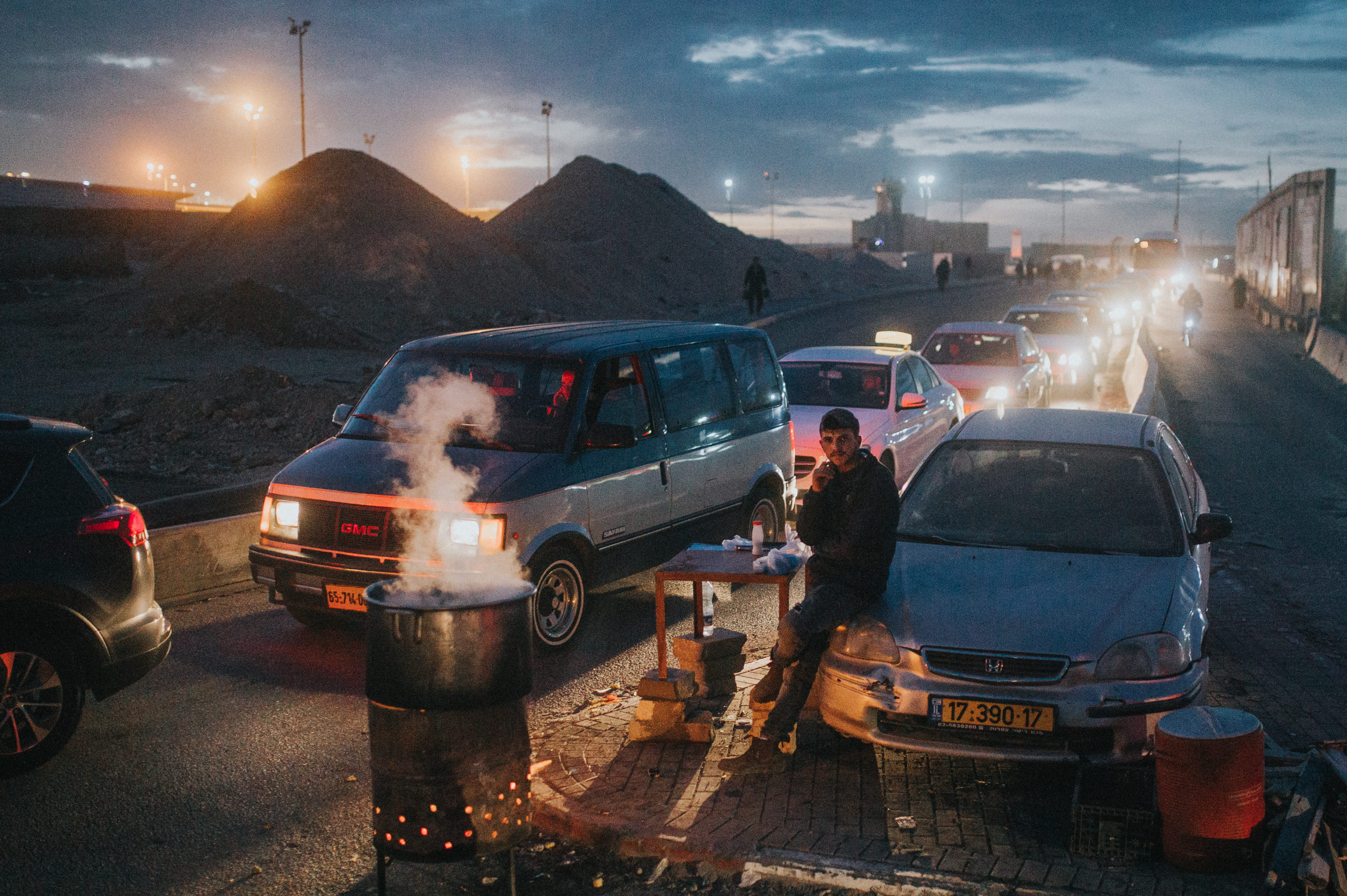 mountain, night, preparing food, ramallah checkpoint, van, people, road, palestine, leaning, 4K, sky, men, flame, cloud - sky, human, light, architecture, HD Wallpaper