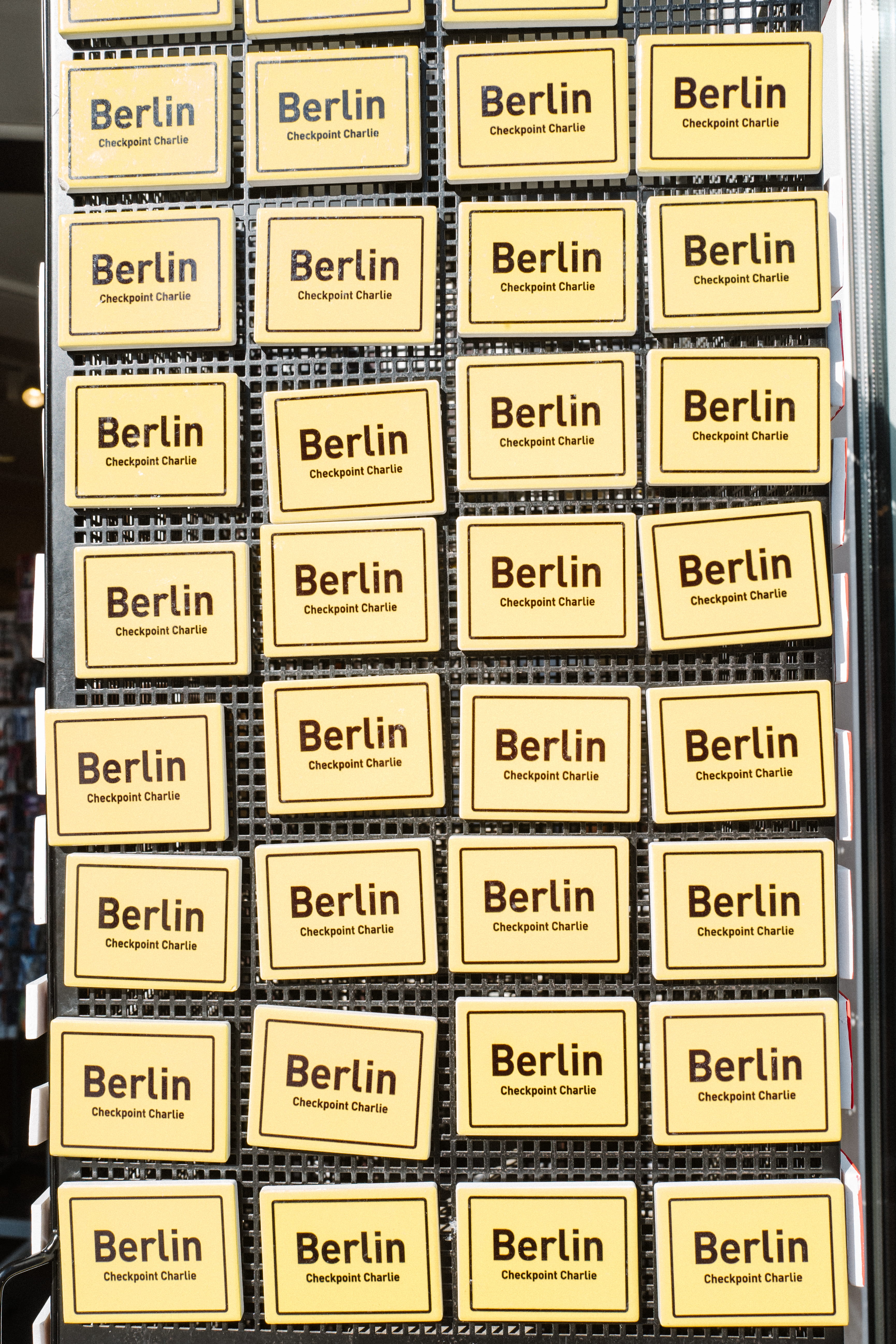 large group of objects, tourist, in a row, backgrounds, text, still life, high angle view, no people, side by side, indoors, 5K, germany, abundance, communication, Phone HD Wallpaper