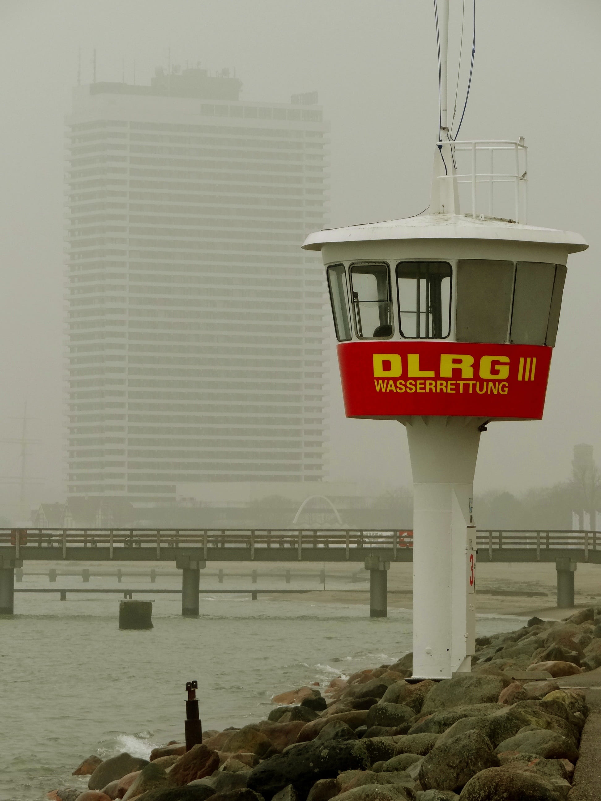 sea, sign, built structure, no people, cold temperature, coast, seaside resort, northern germany, 2K, communication, connection, day, nature, water, tower, Phone HD Wallpaper