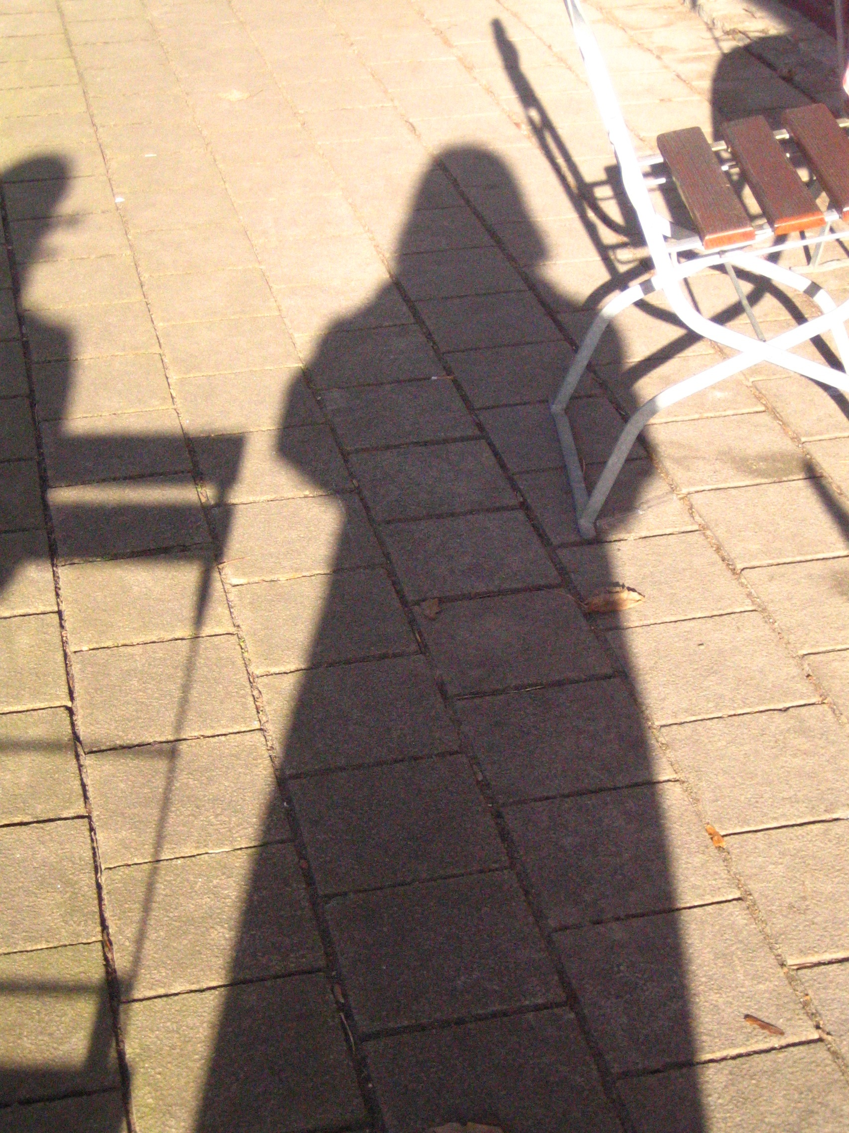 light, darth vader, people, real people, human, outdoors, shadow, personal, sunlight, shadow play, footpath, street, paving stone, fashion, dark side of power, Phone HD Wallpaper