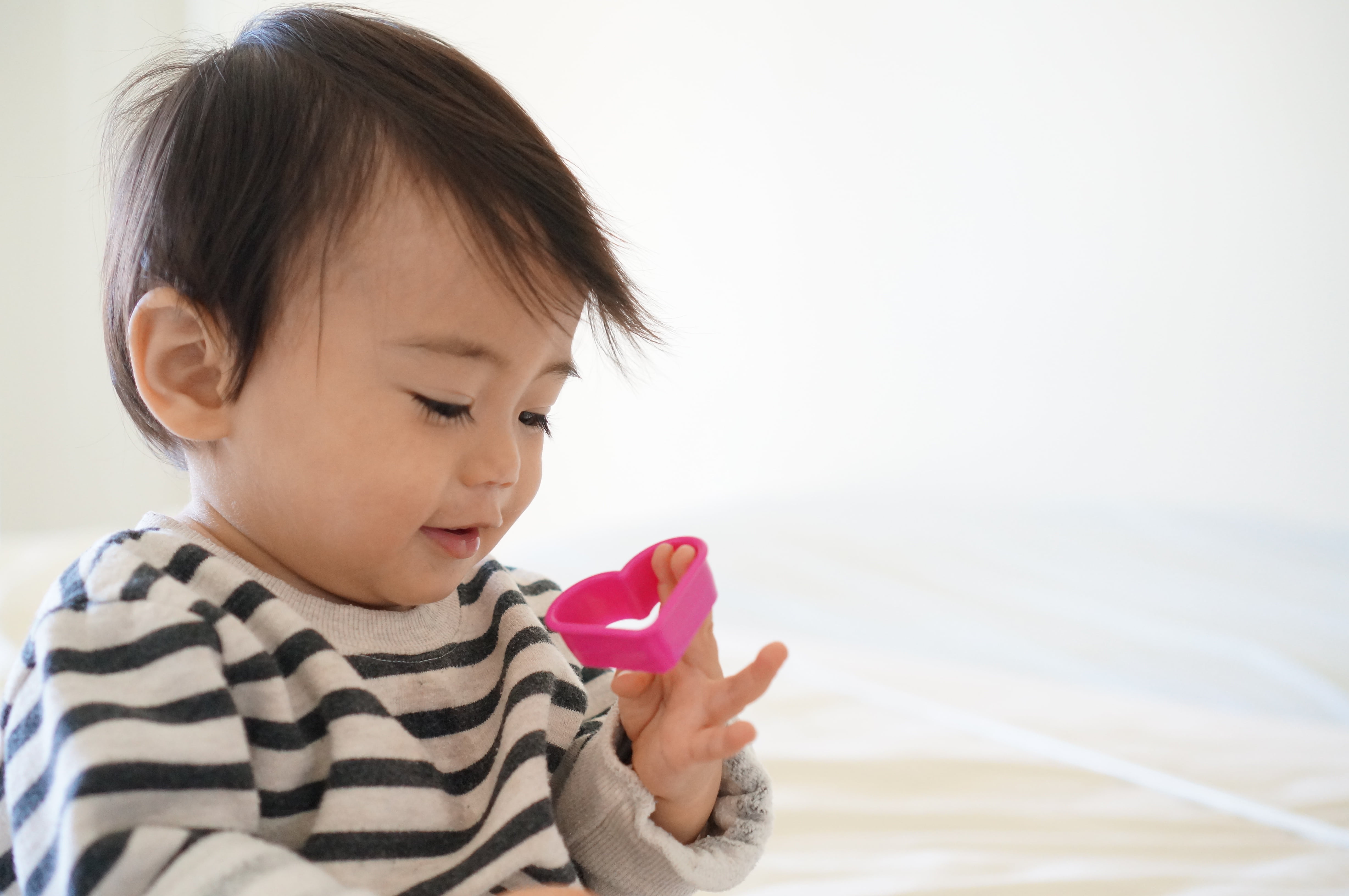 new, kid, pink, newborn, toy, smiling, emotion, happy, portrait, son, person, healthy, bed, one person, 4K, young, child, human, happiness, caucasian, HD Wallpaper