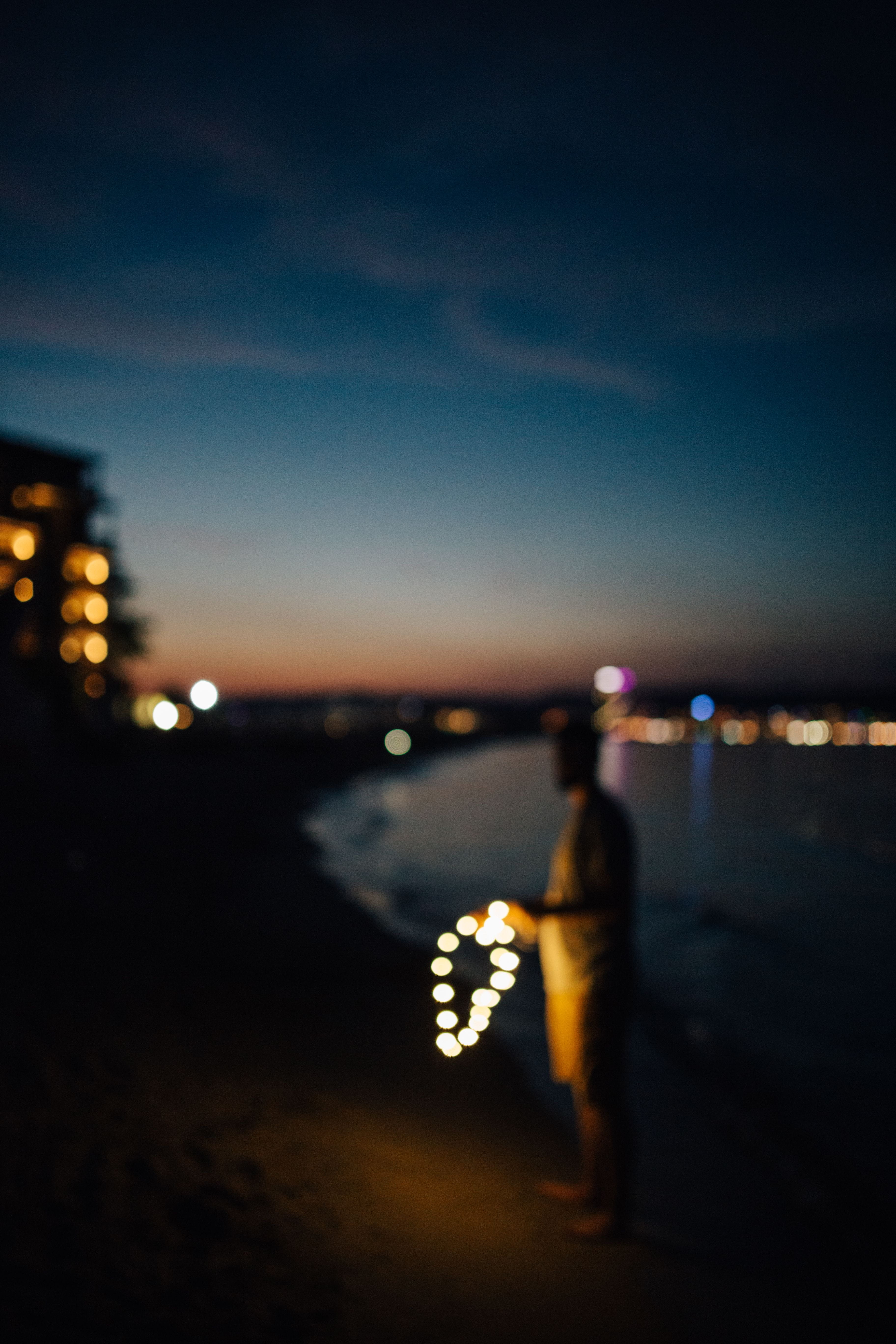 beach, 5K, summer, standing, seaside, Europe, transportation, focus on foreground, night, black sea, sea, bokeh, shore, real people, dusk, man, defocused, Phone HD Wallpaper