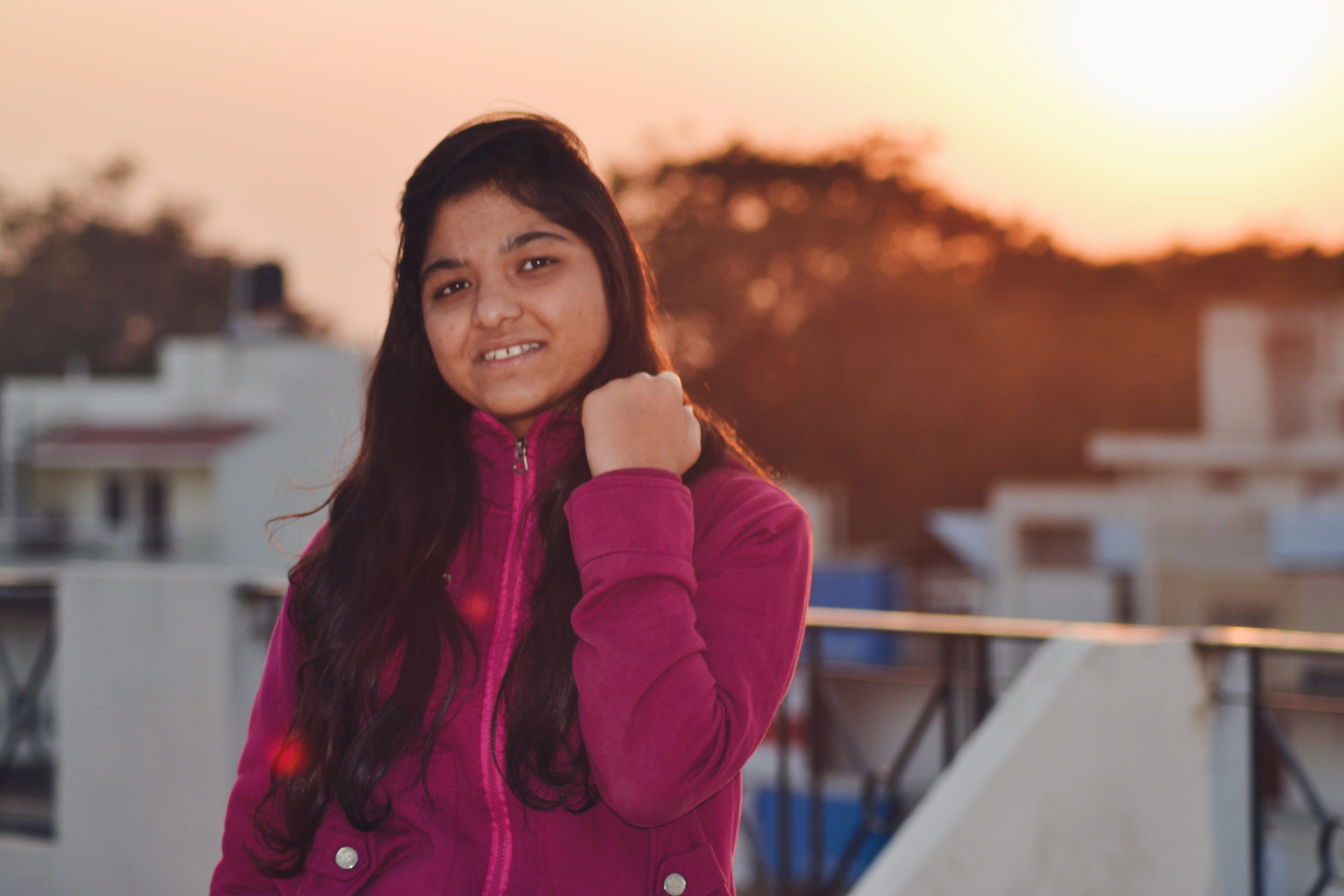 standing, clothing, beautiful woman, focus on foreground, zip, city, blurred background, portrait, s, architecture, built structure, scarf, indian, pink, HD Wallpaper