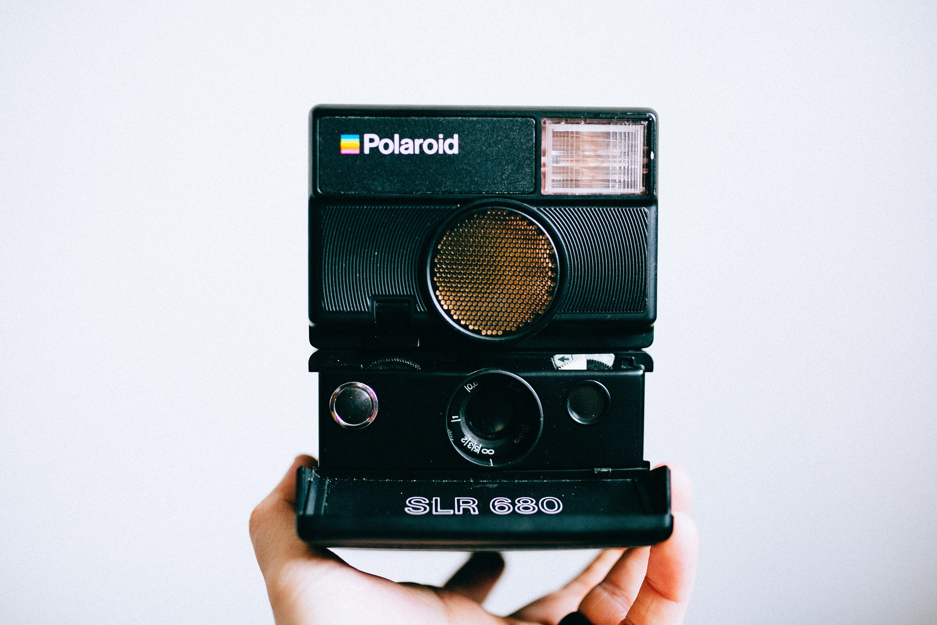 technology, holding, person, camera, black, screen, strap, human hand, photographing, display, polaroid, window, old, cassette player, photography themes, HD Wallpaper