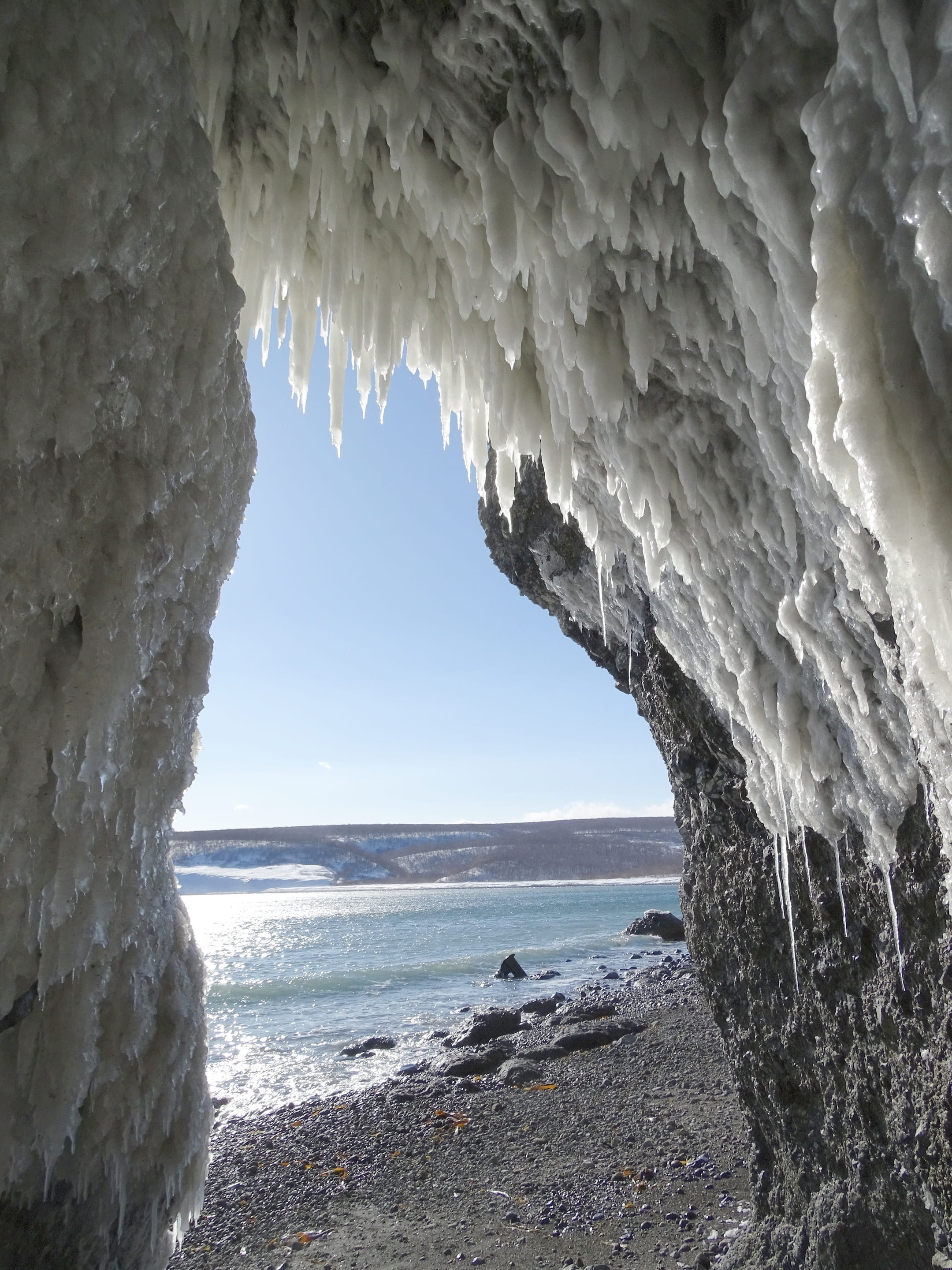 icicles, travel, natural arch, sea, sky, arch, coast, tranquil scene, tranquility, horizon over water, rock formation, scenics - nature, no people, cave, Phone HD Wallpaper