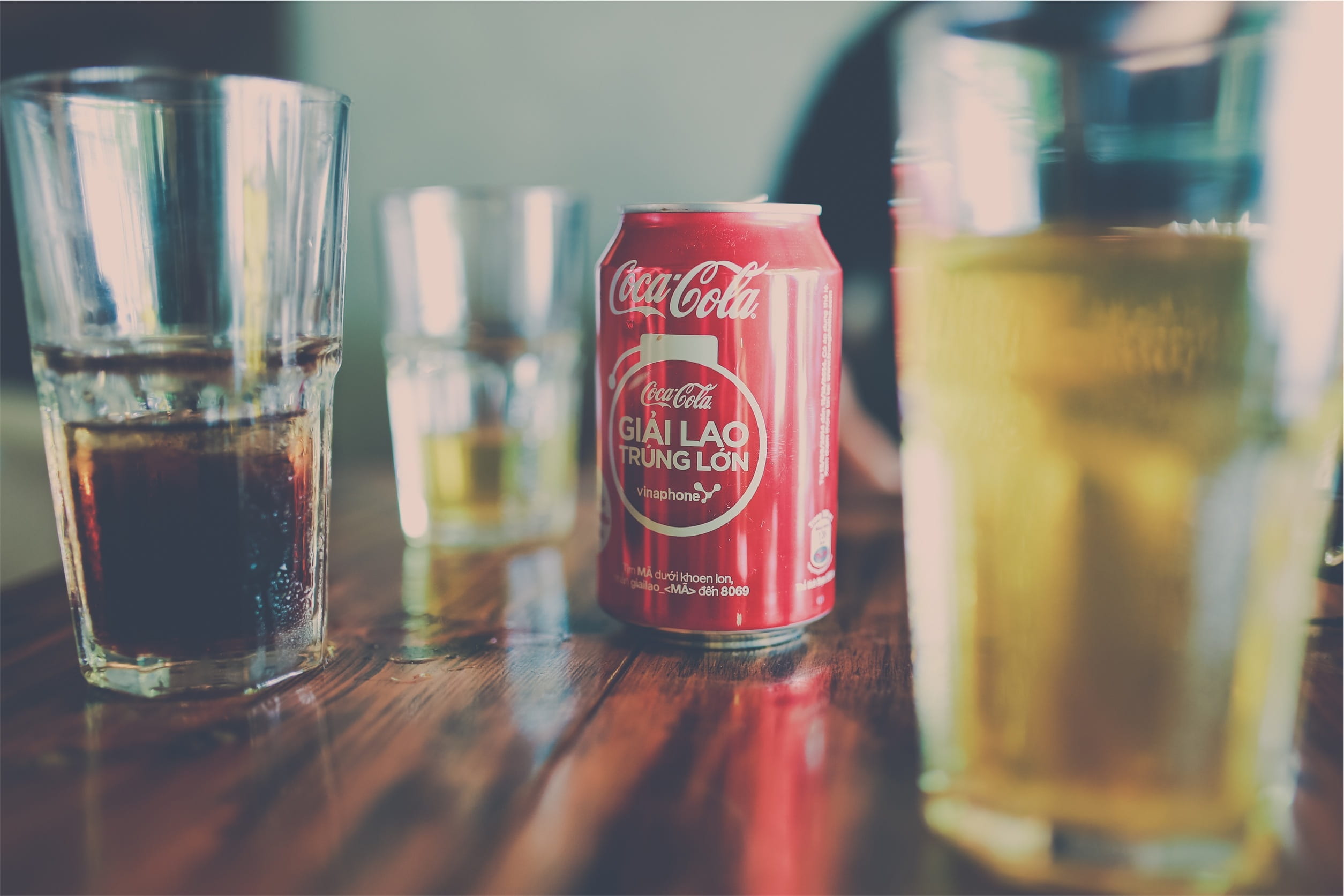 glass - material, no people, jar, coca cola, indoors, container, table, wood - material, soft drink, food and drink, beside, glass, 1080P, freshness, focus on foreground, HD Wallpaper