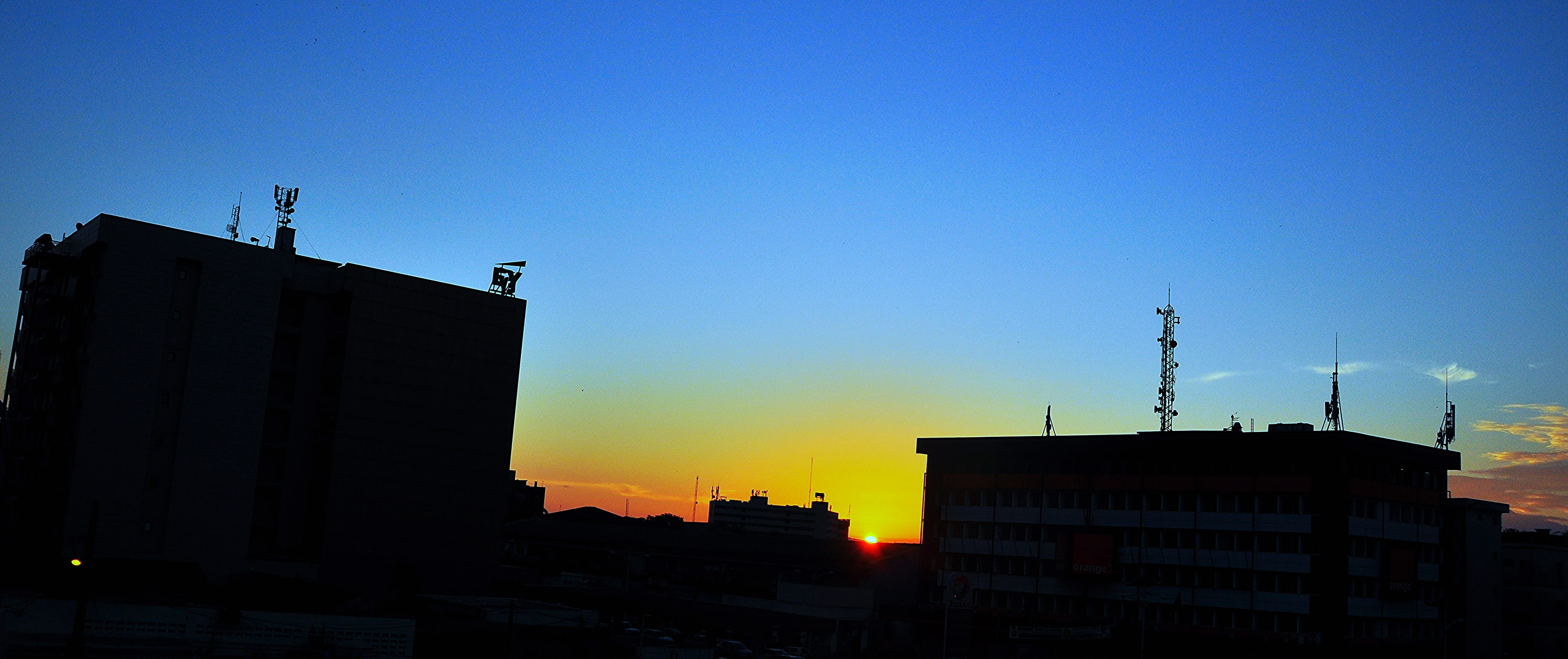 residential district, building, industry, cityscape, cameroun, romantic sky, sunset, silhouette, africa, buildings, 4K, city life, built structure, tower, HD Wallpaper