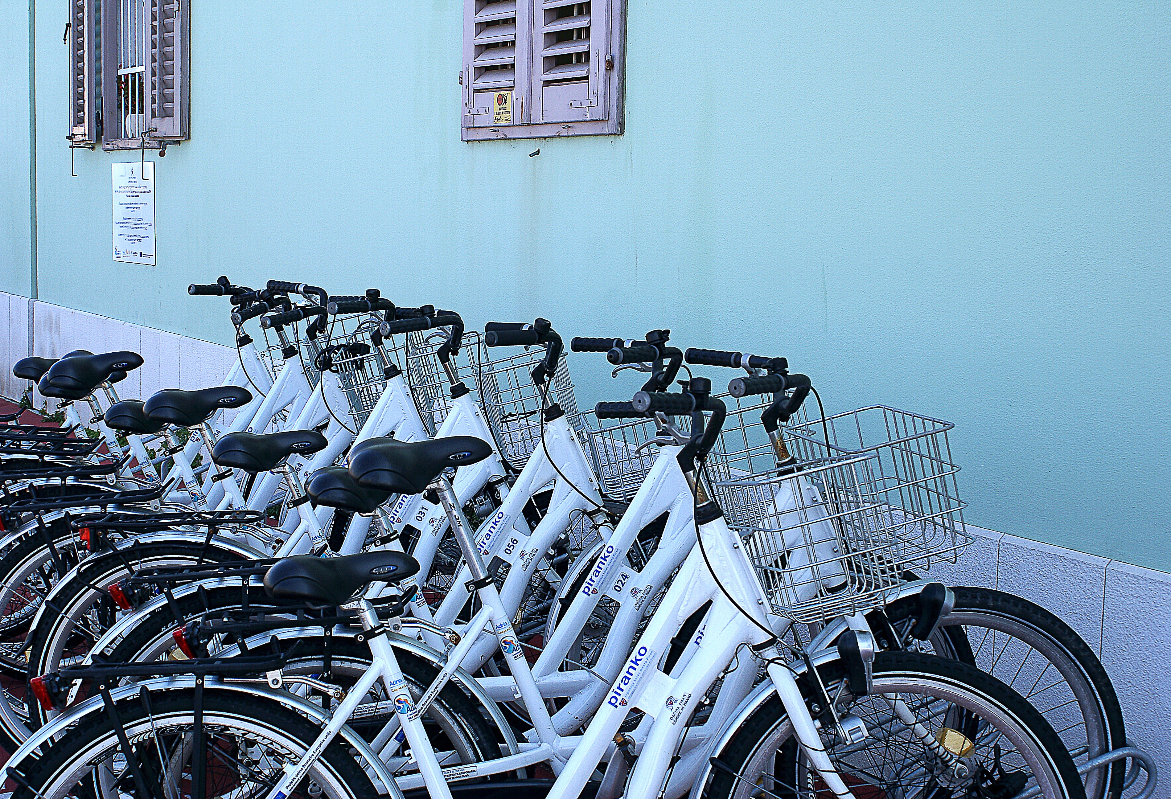 bicycle parking, outdoors, bicycle, blue, city, in a row, means of communication, nut, mode of transportation, the background, building, built structure, HD Wallpaper