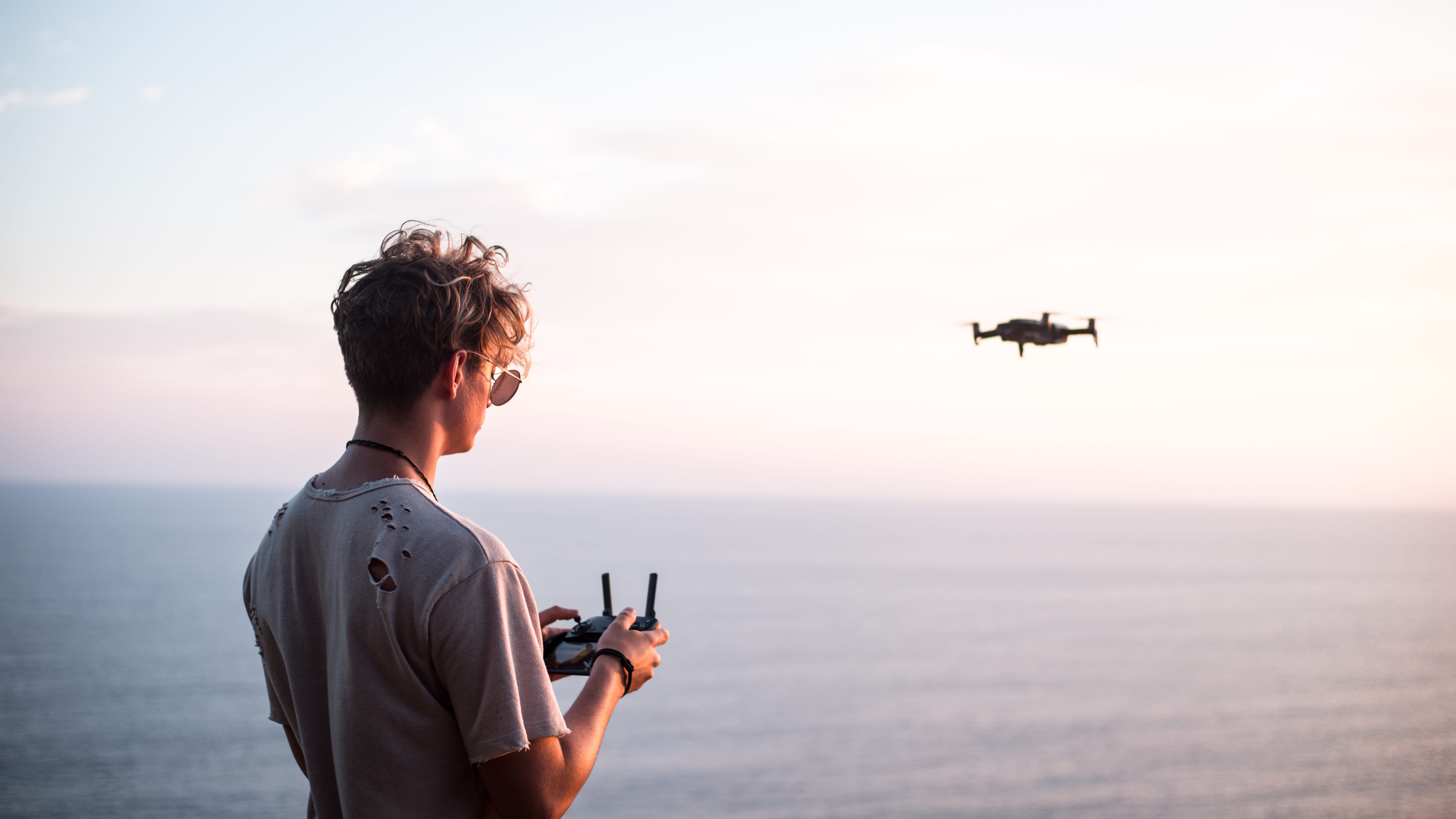 portrait, quadcopter, technology, holding, cloud, oahu, air vehicle, remote control, sunset, hawaii, model, looking, drone, standing, 5K, style, near, HD Wallpaper