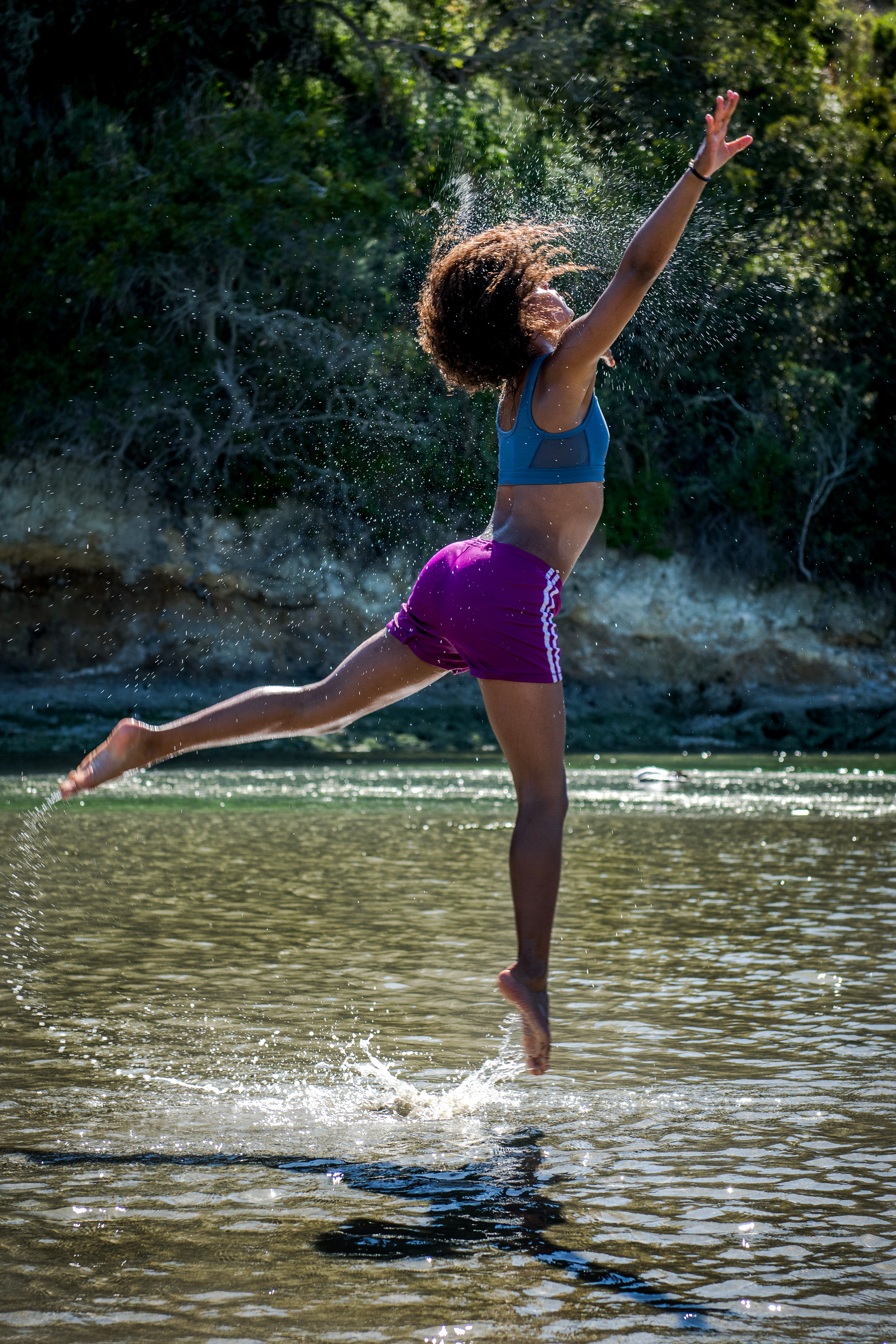 full length, body, woman, jump, human, excitement, near, enjoyment, arms outstretched, river, 8K, waterfront, outdoors, clothing, rear view, real people, Phone HD Wallpaper