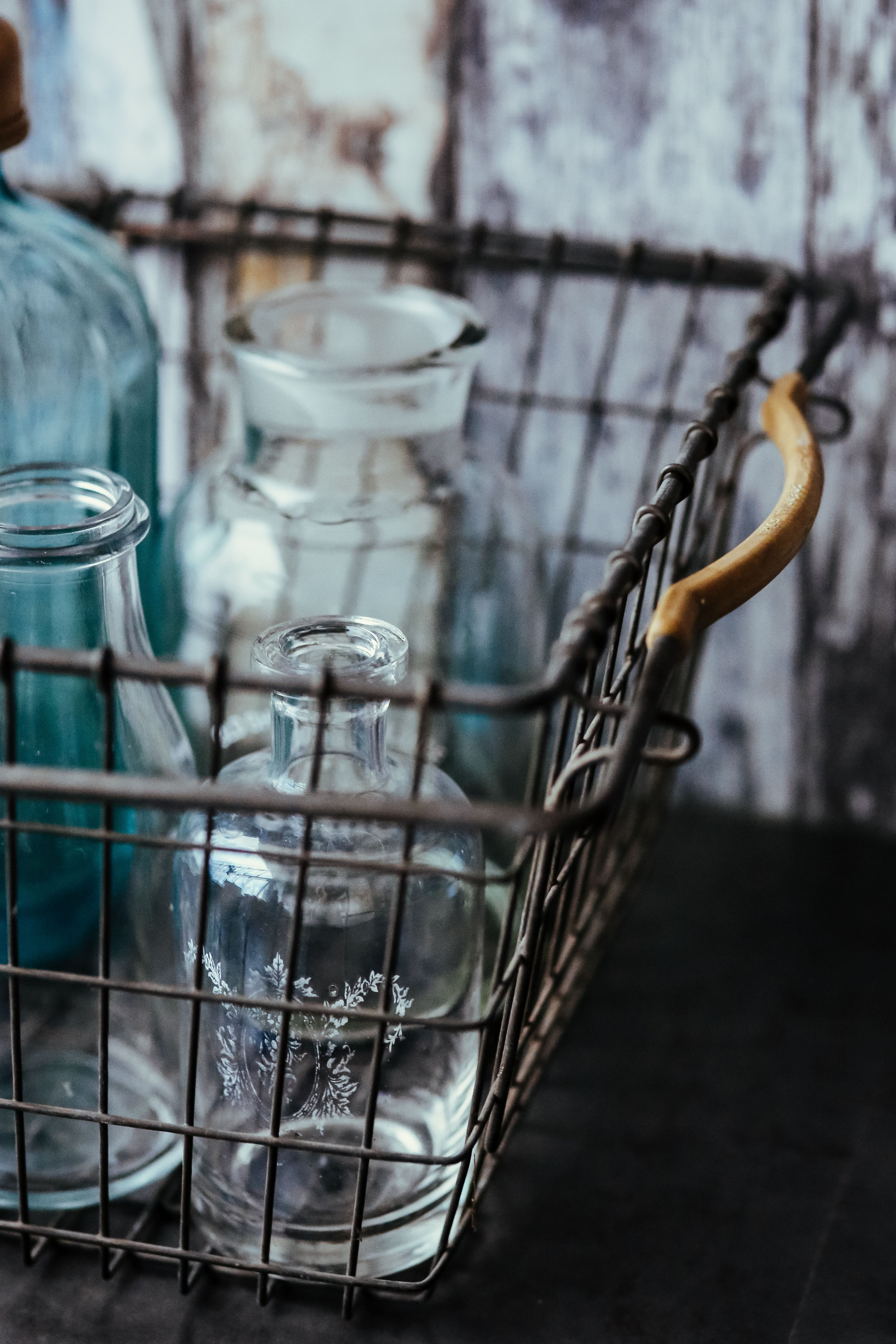 focus on foreground, art and craft, basket, hanging, 5K, chain, bottles, mesh, cage, selective focus, retro, indoors, wall - building feature, glass - material, Phone HD Wallpaper