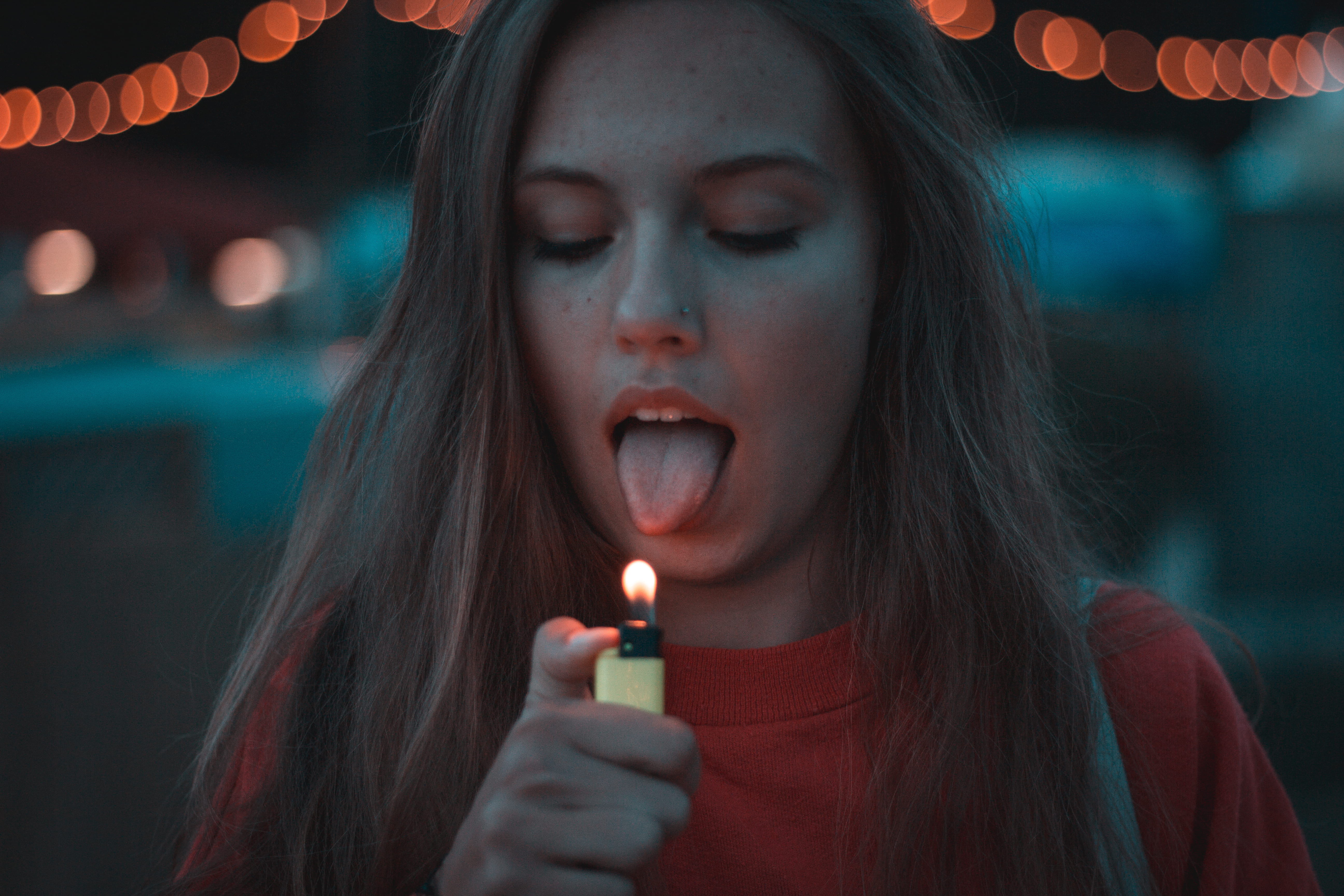 flame, festival, close-up, hairstyle, adult, holding, woman, long hair, tongue, one person, schwarzwald, lighting, yellow, red, lowlight, germany, human body part, HD Wallpaper
