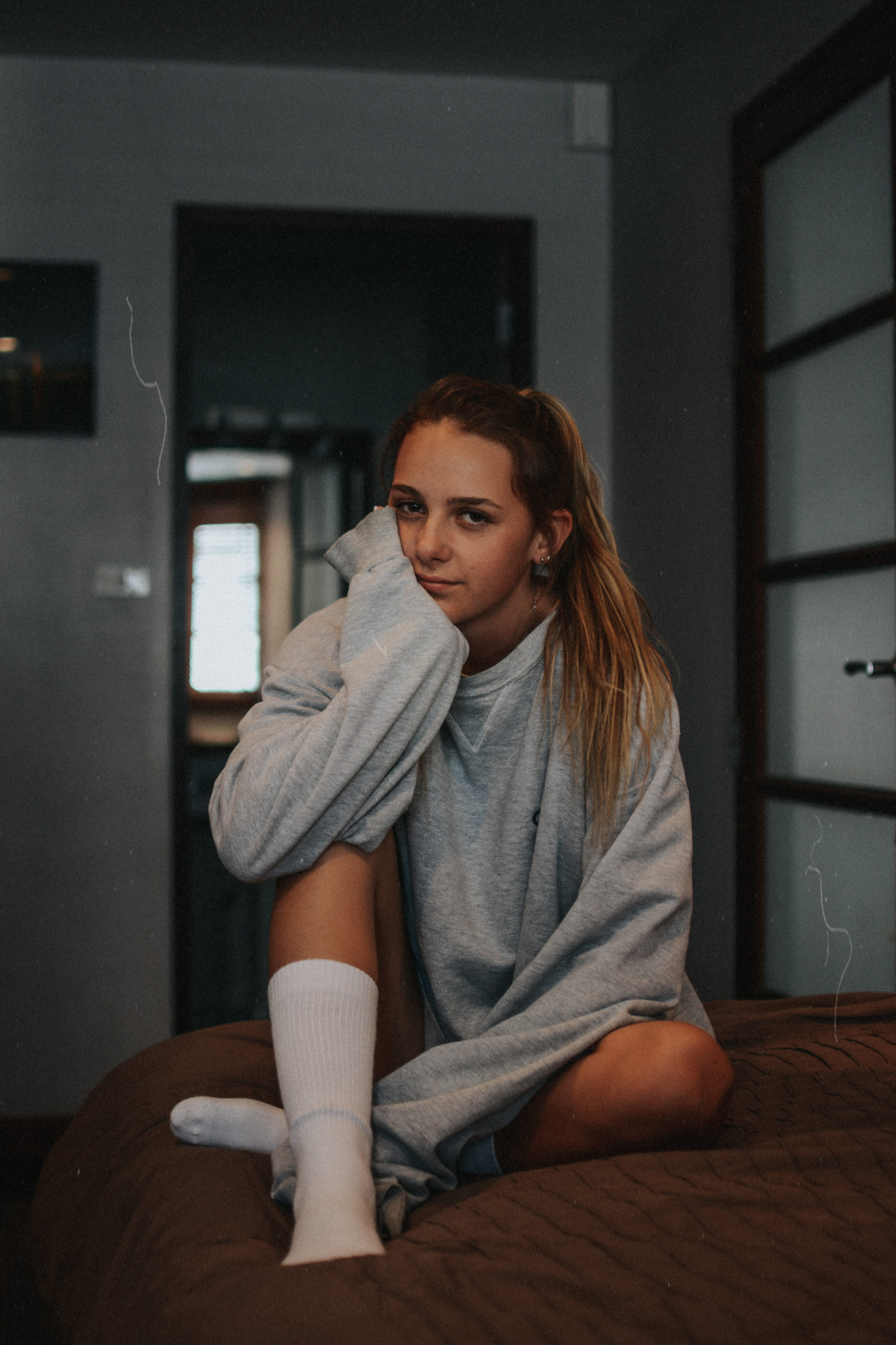 home interior, woman, person, bedroom, teenager, mood, casual clothing, wearing, lifestyles, girl, hairstyle, contemplation, dark, young adult, looking at camera, Phone HD Wallpaper