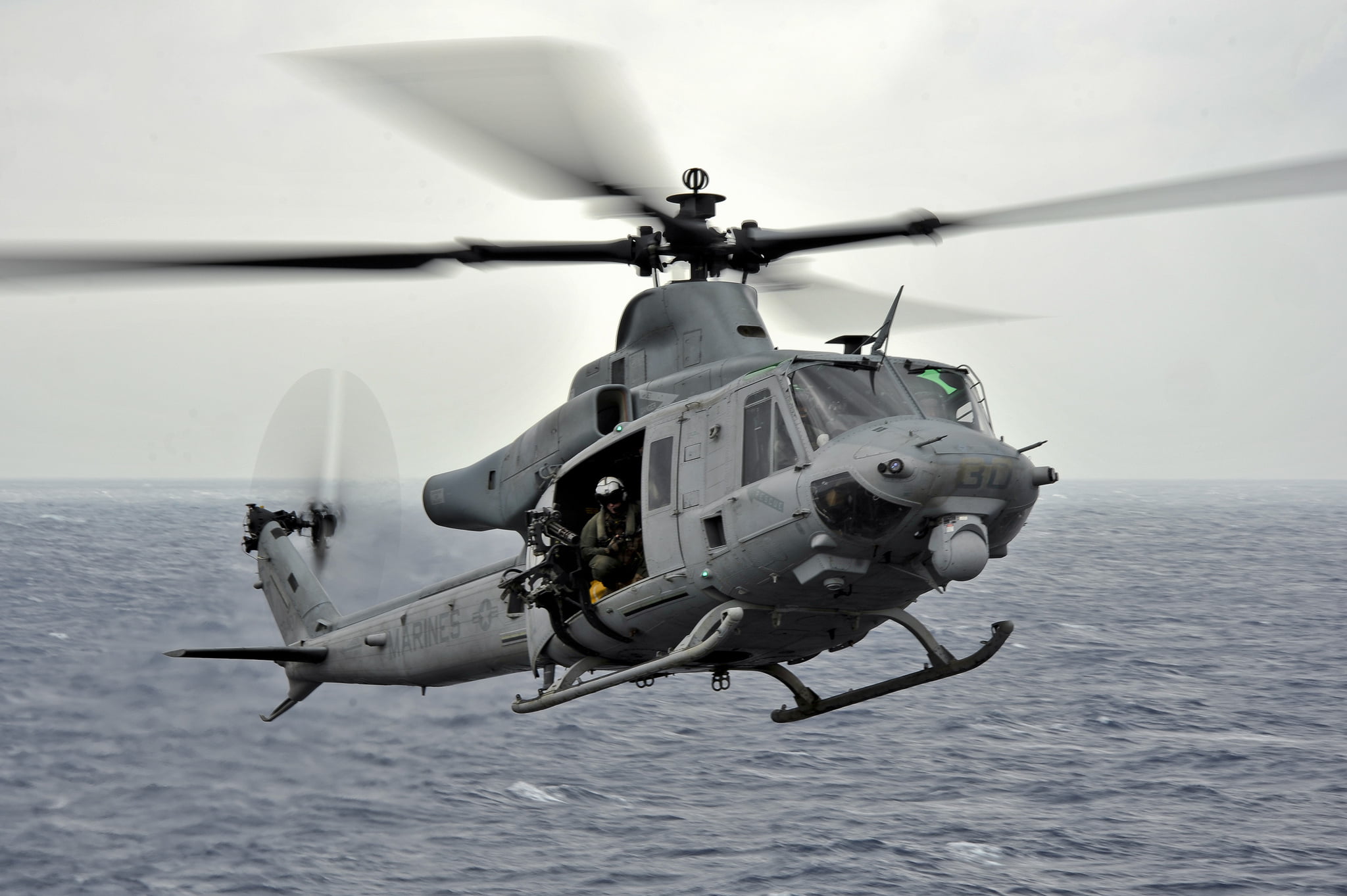 flying, nature, motion, sky, waterfront, helicopter, mode of transportation, military, day, 1080P, mid-air, air vehicle, transportation, propeller, Bell UH-1Y, HD Wallpaper